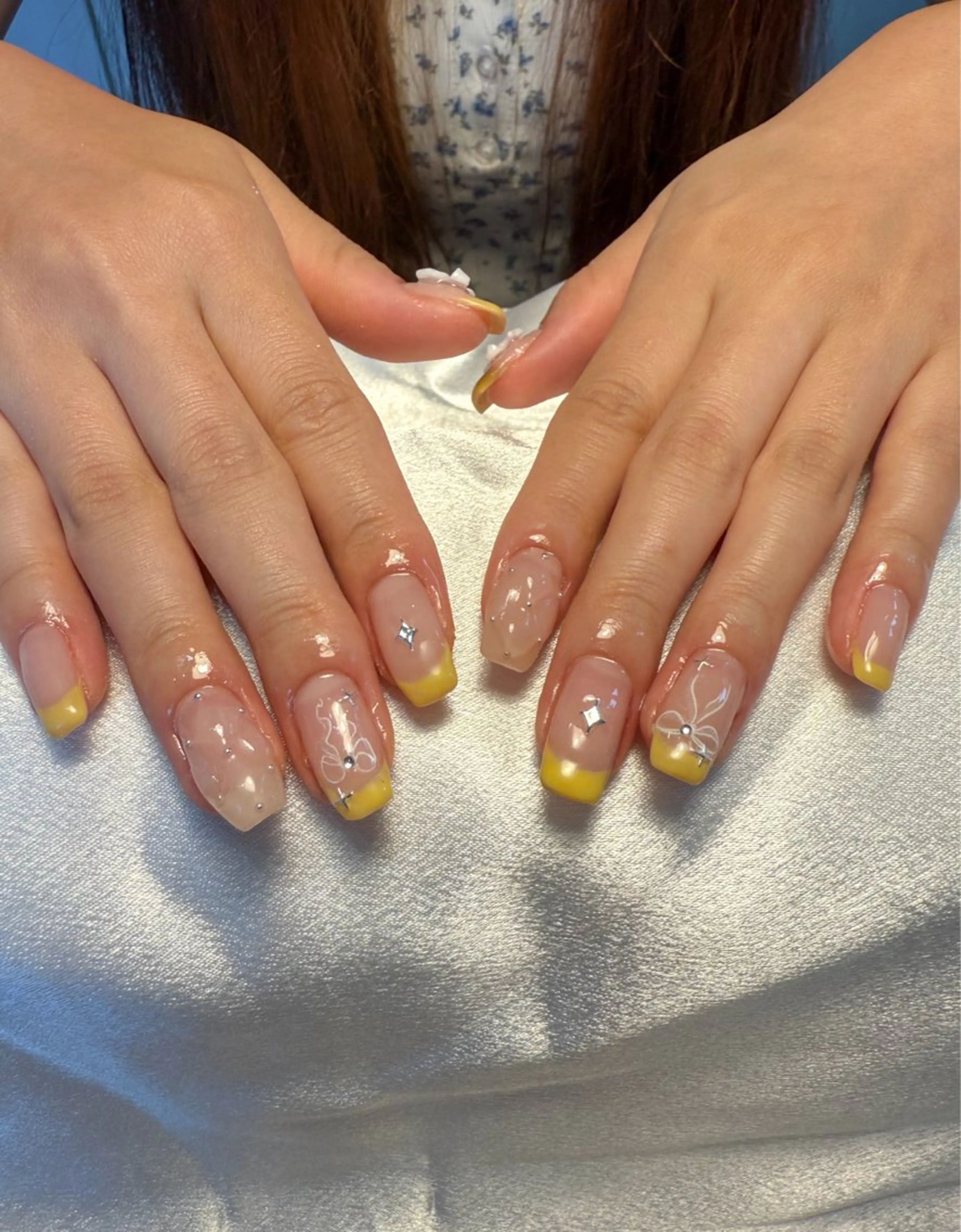 ネイル フレンチネイル 持ち込み リボン 夏ネイル 黄色 ハンドネイル nail salon Estelleのネイルデザイン