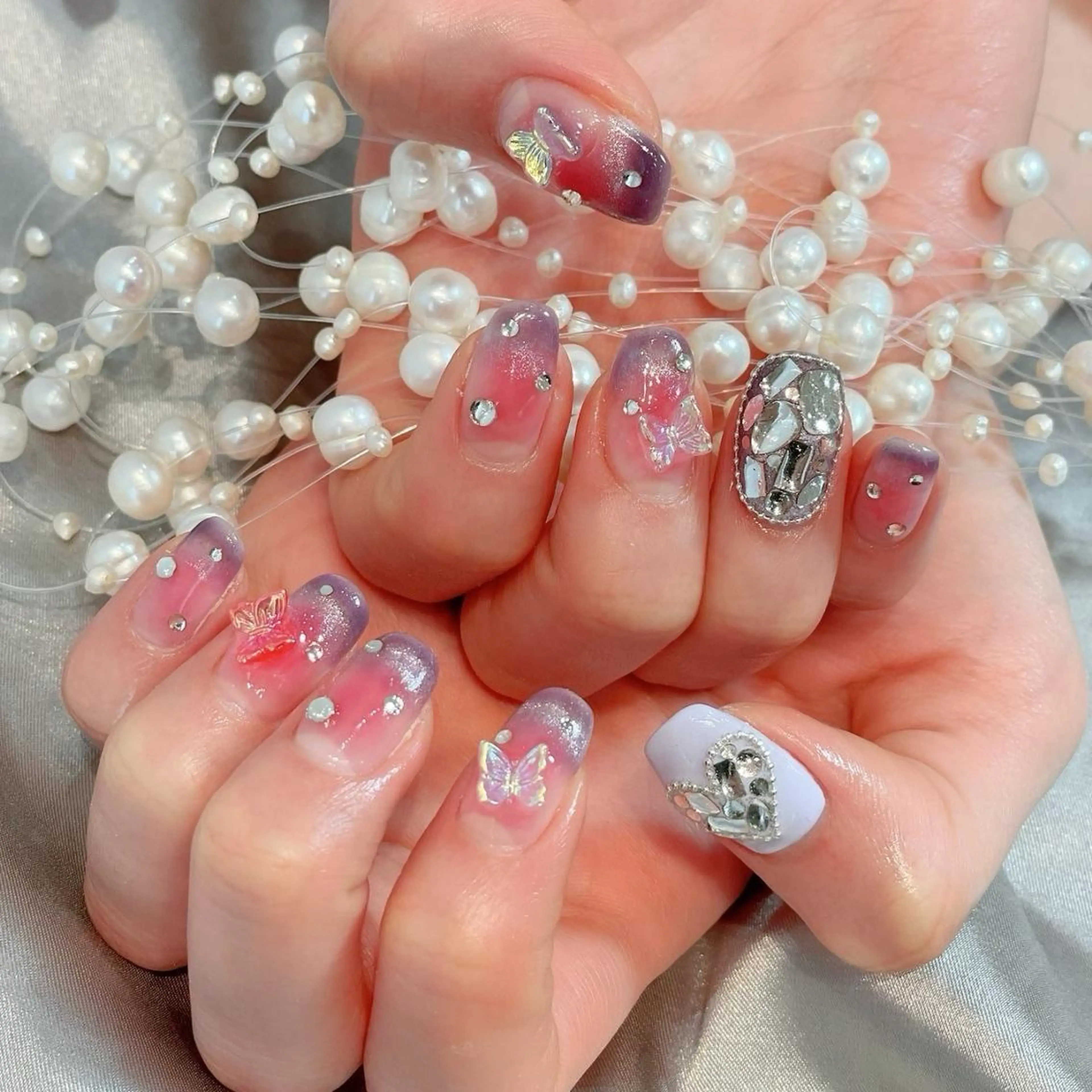 ネイル RAFFINE 月🦋🩵のネイルデザイン