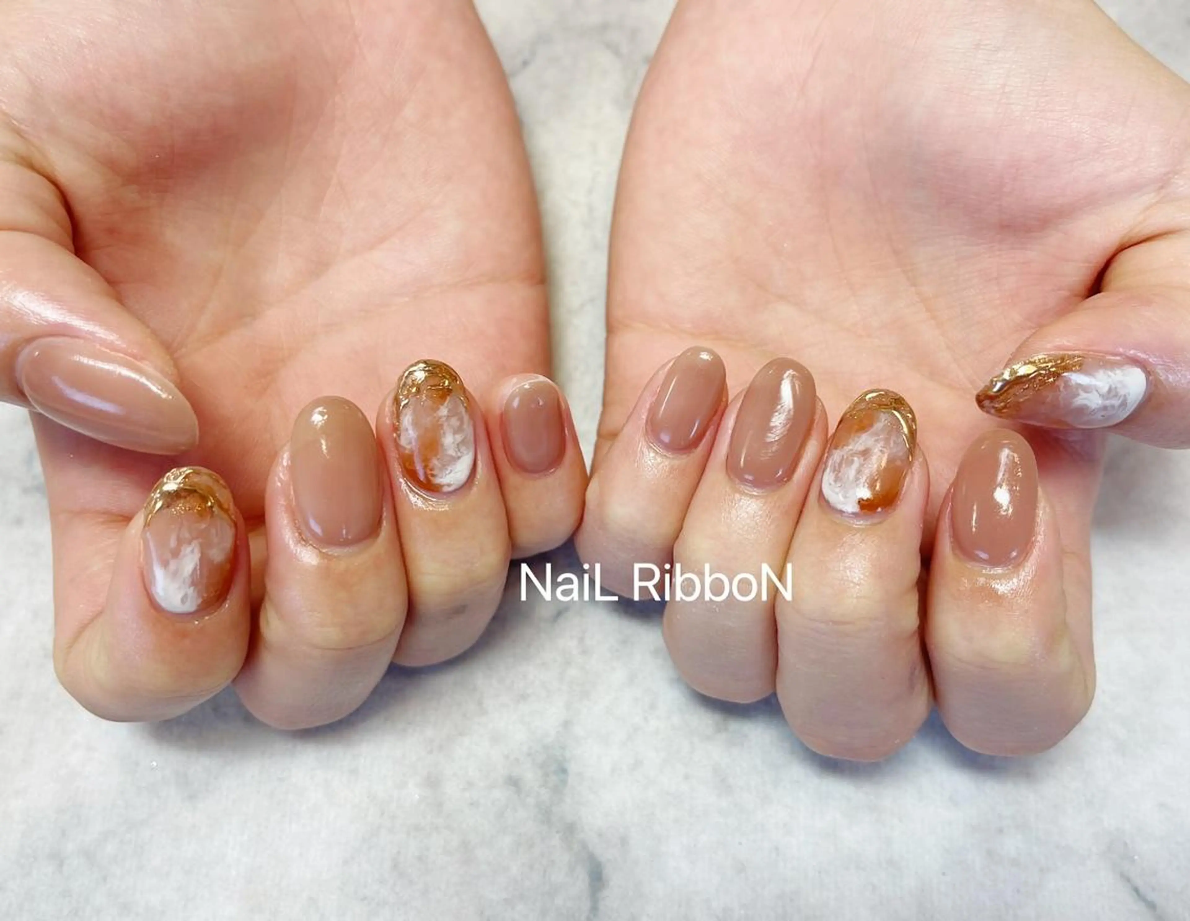 ネイル ネイルリボン 受付スタッフのネイルデザイン