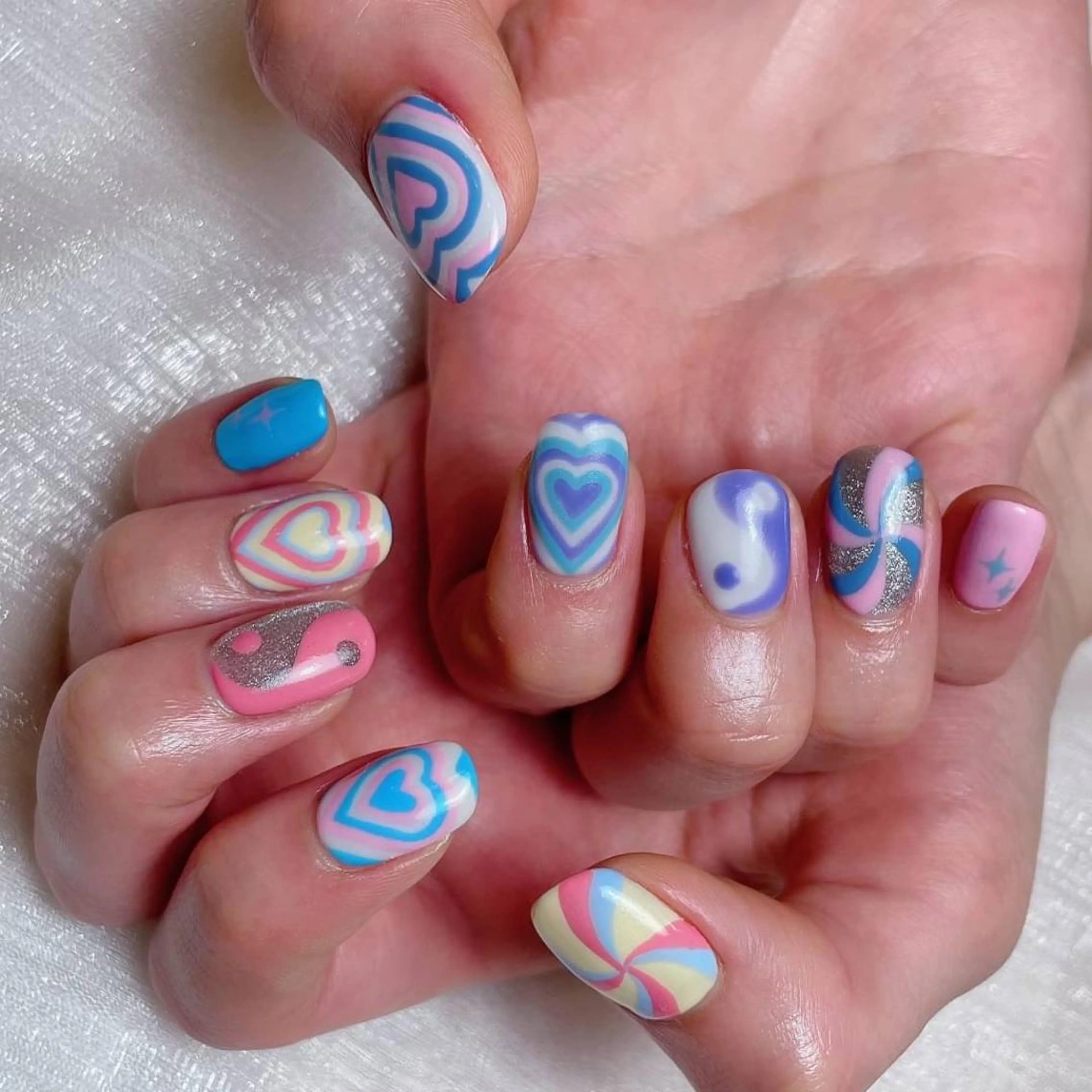 ネイル RAFFINE 月🦋🩵のネイルデザイン