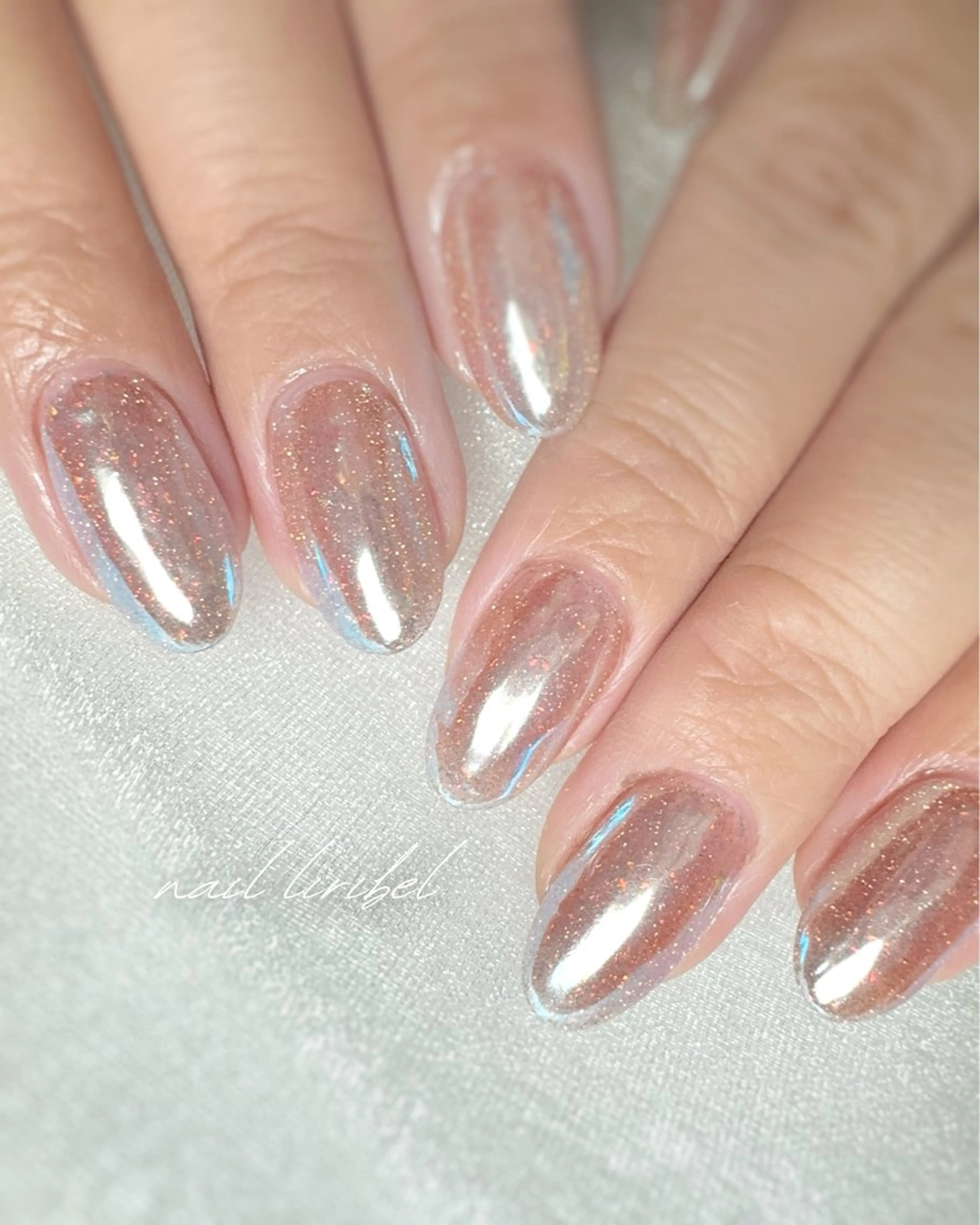 ネイル オーロラネイル フラッシュネイル キラキラネイル ワンカラーネイル シンプルネイル ハンドネイル Nail Liribelのネイルデザイン