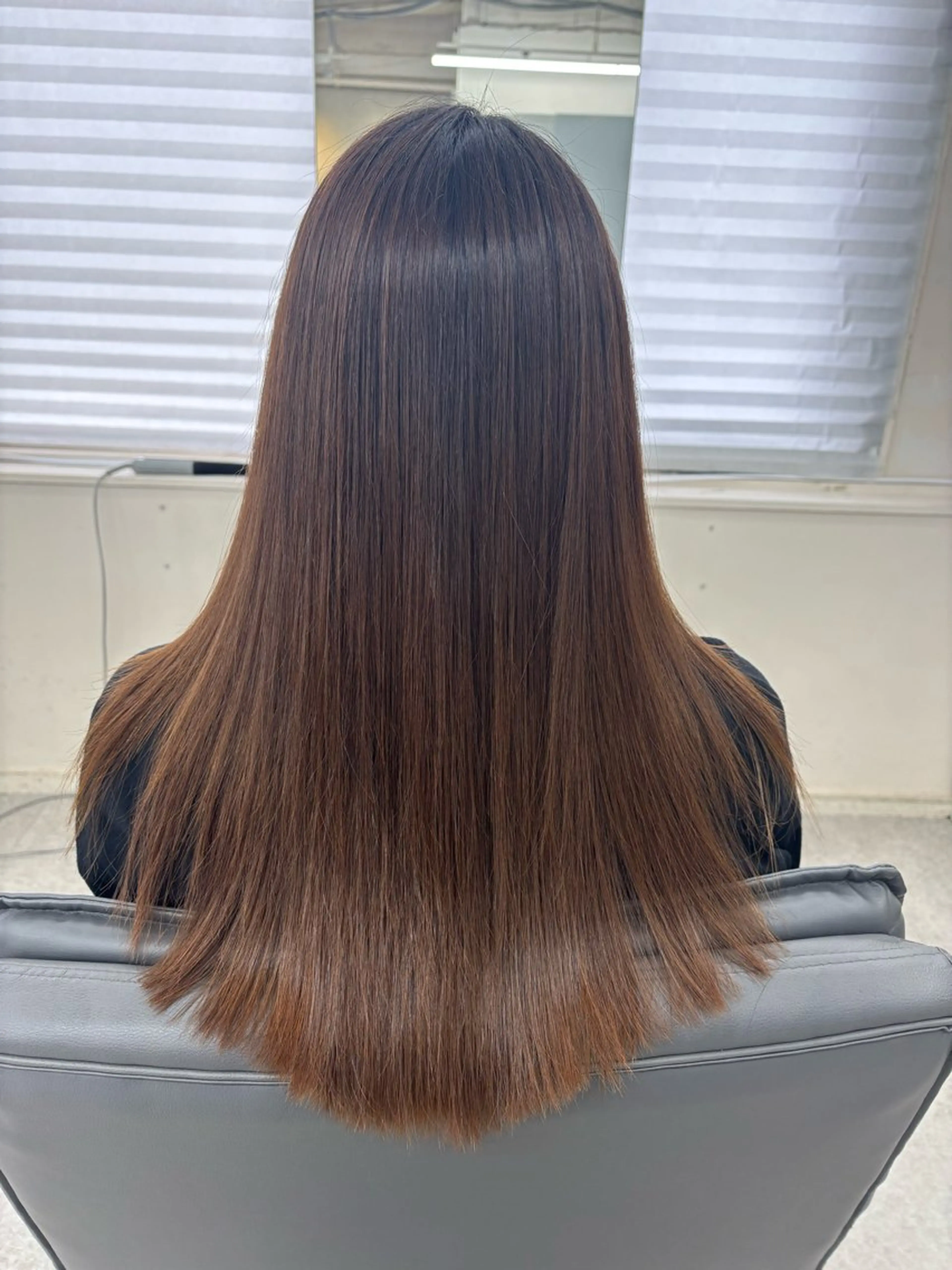 ロング 腰越 麻奈のヘアスタイル
