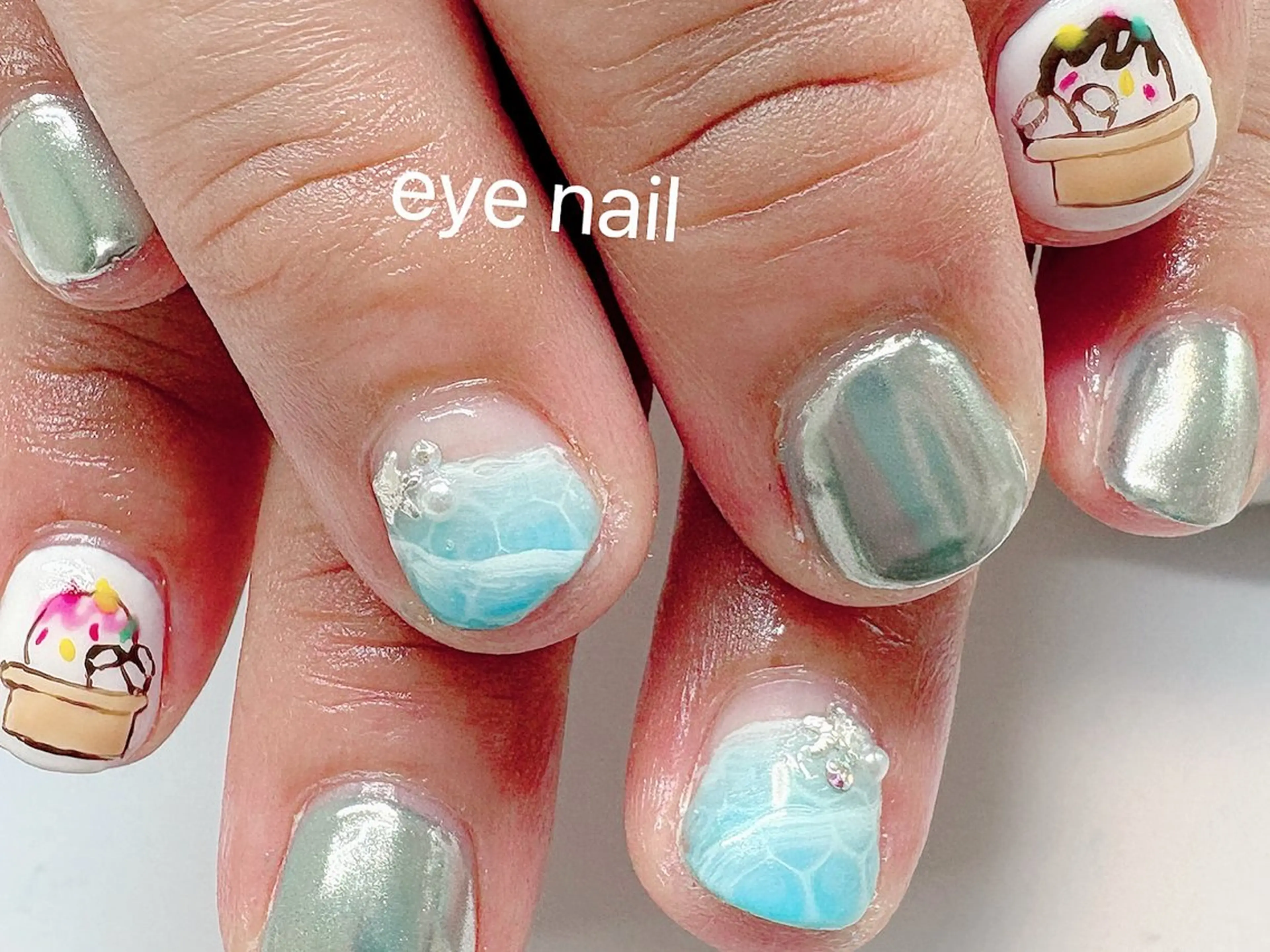 ネイル アートネイル ブルー ミラーネイル 夏ネイル ハンドネイル Eye nailのネイルデザイン