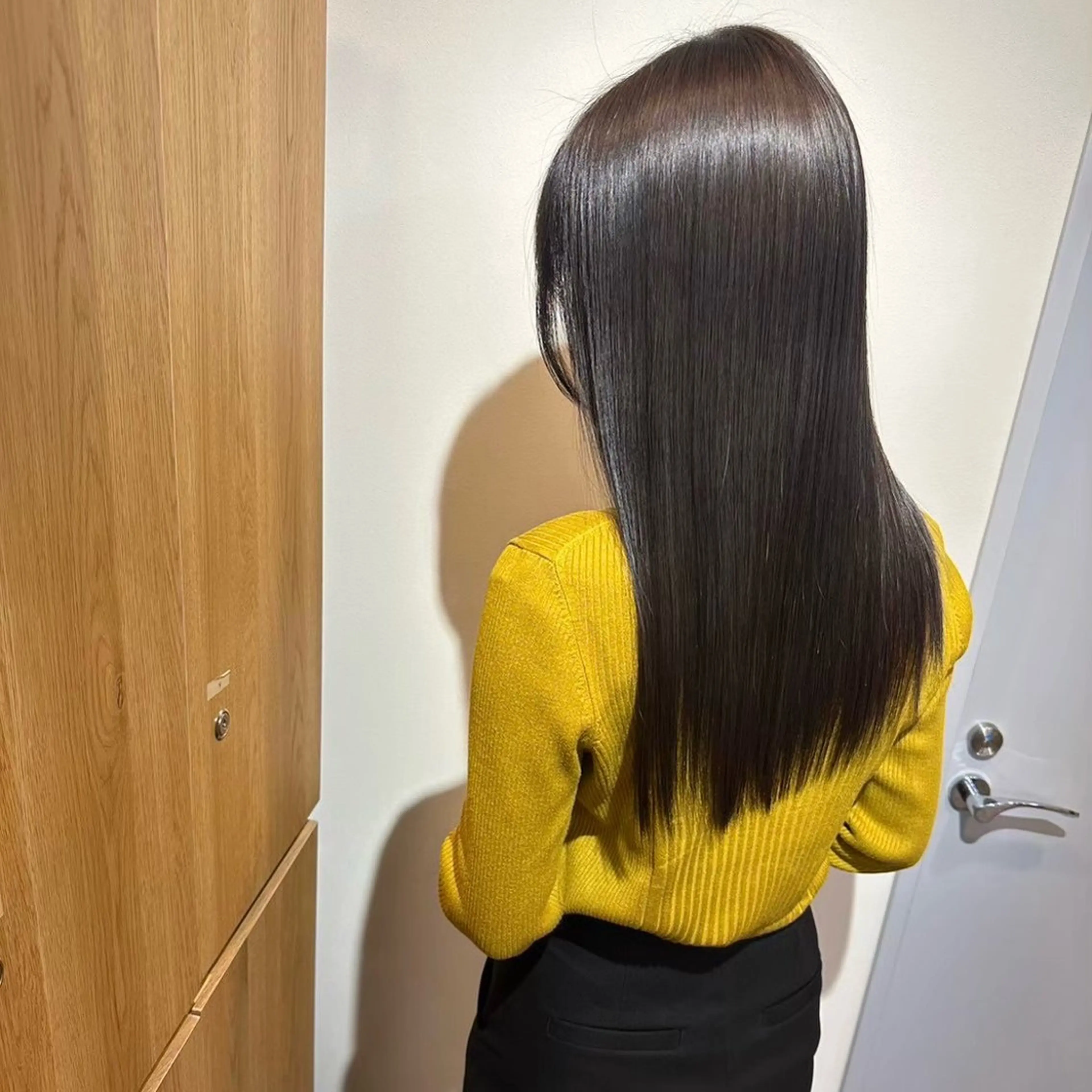 ロング 岡田 佳子のヘアスタイル