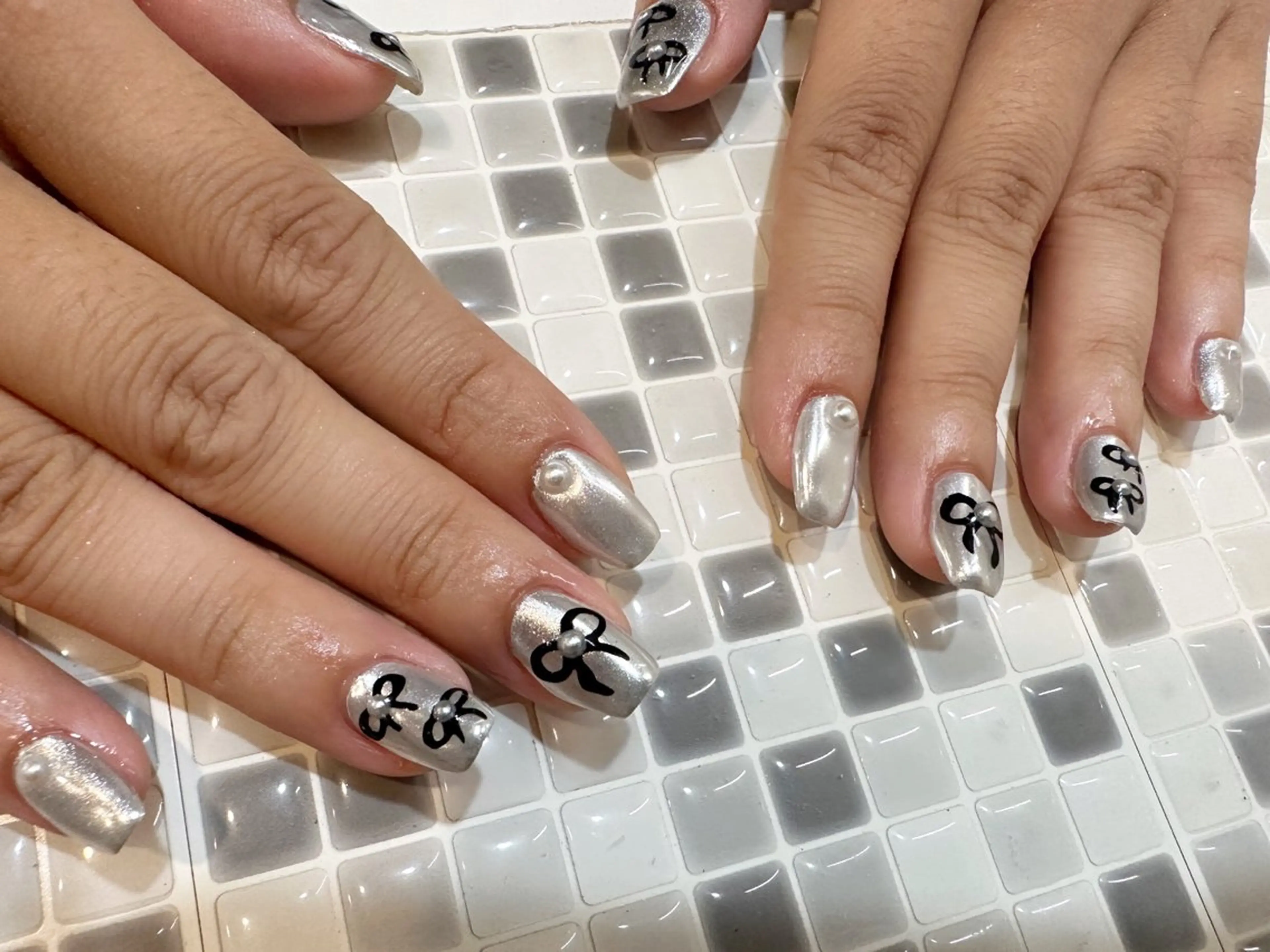 ネイル リボン ♡Nailist yui♡のネイルデザイン