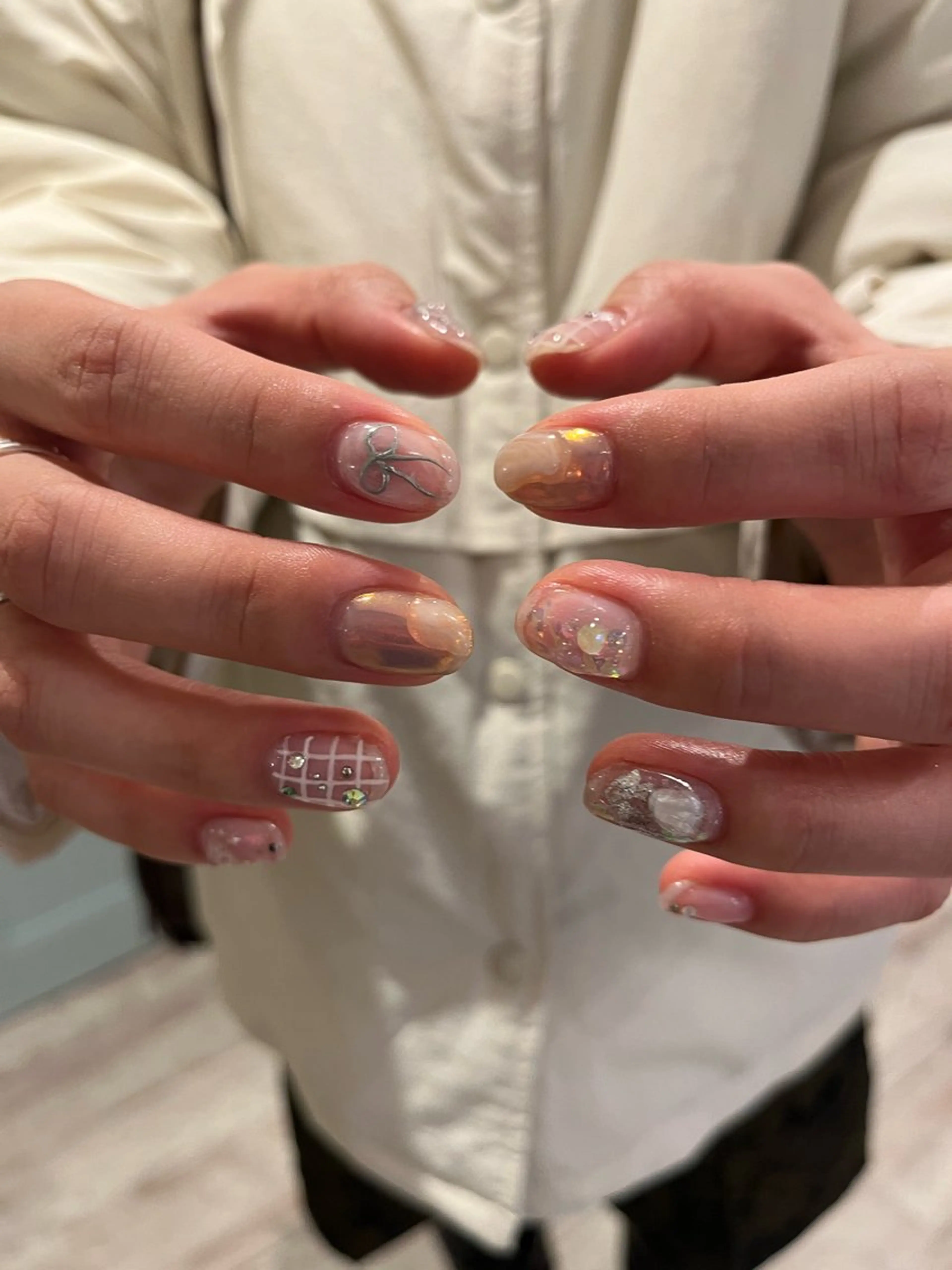 ネイル ハンドネイル une／YUKINA 🫧大人nuanceのネイルデザイン