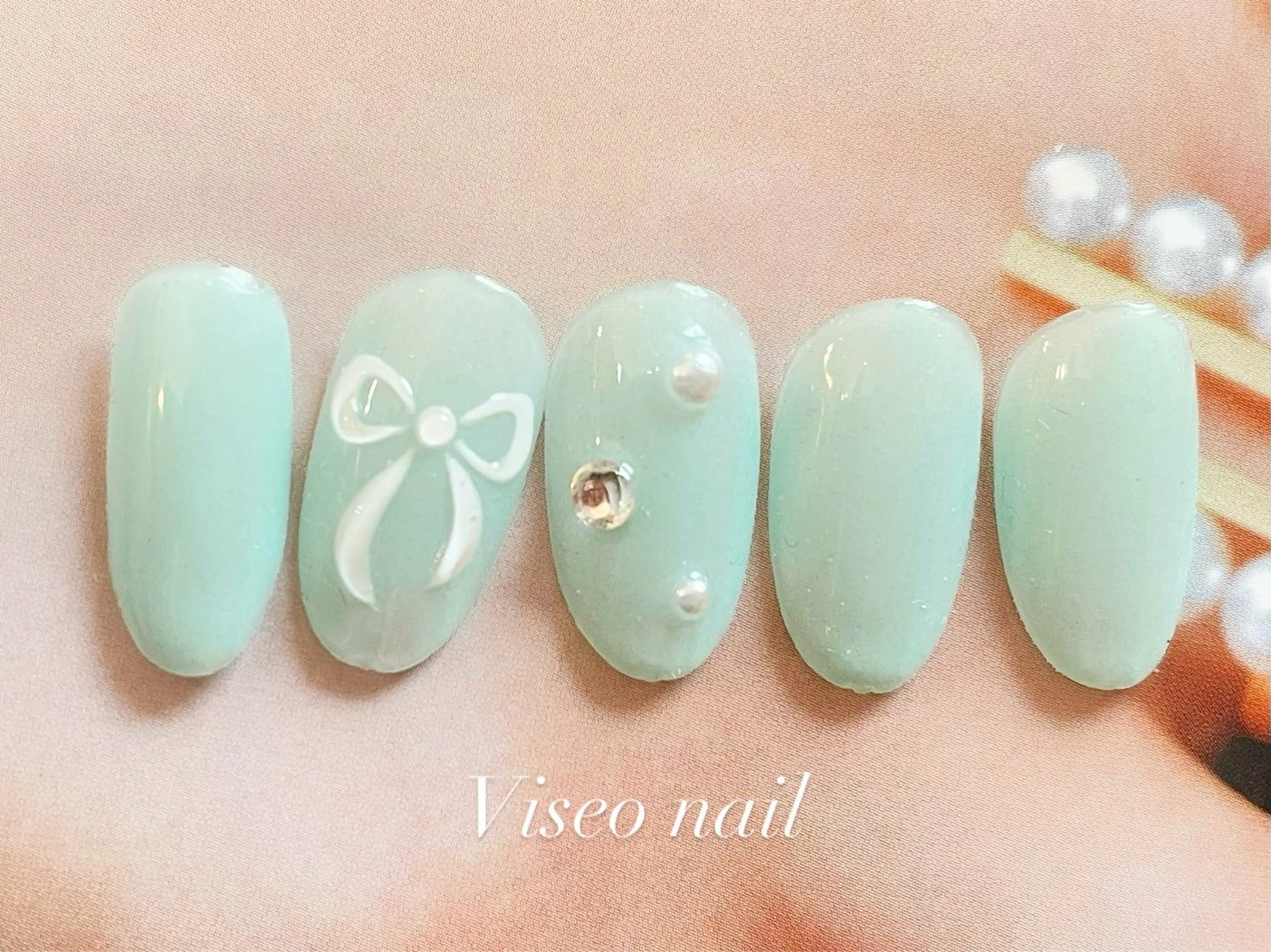 🎀(オフ込み)ティファニーリボンnail/6週間長持ちの写真