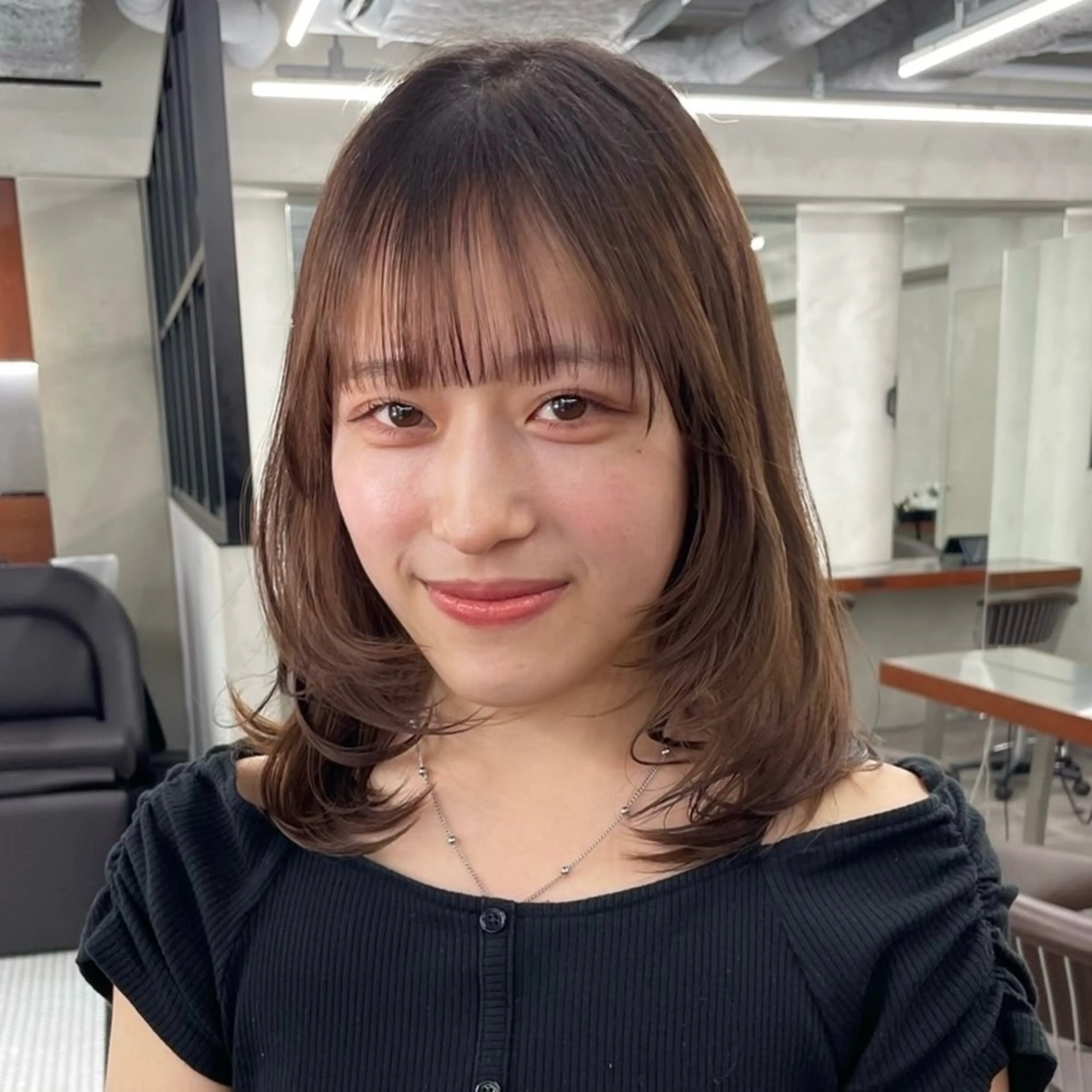 ミディアム センターパート /ニュアンスパーマのヘアスタイル