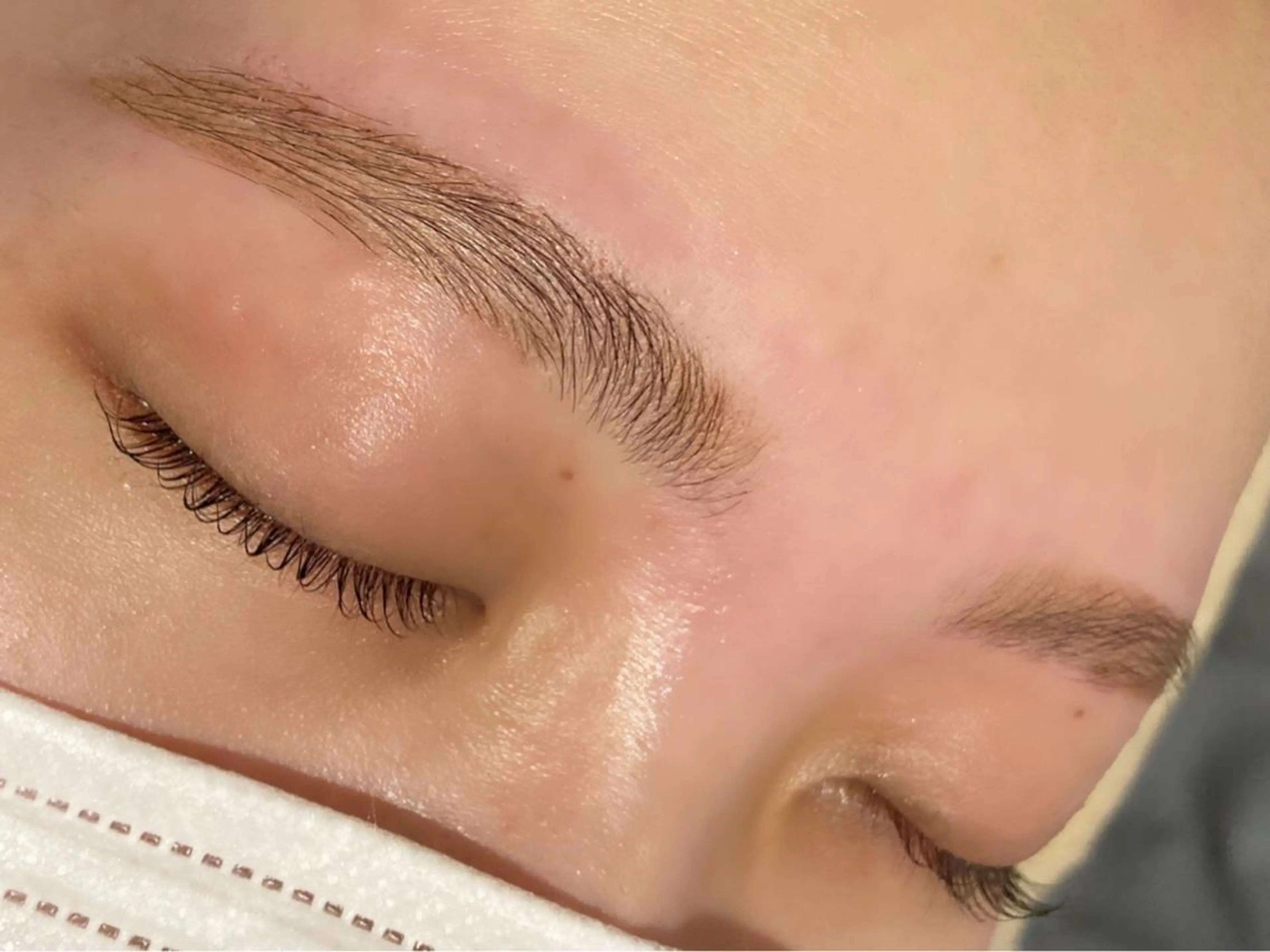 各まつ毛パーマ+アイブロウデザイニング（眉ワックス）の写真