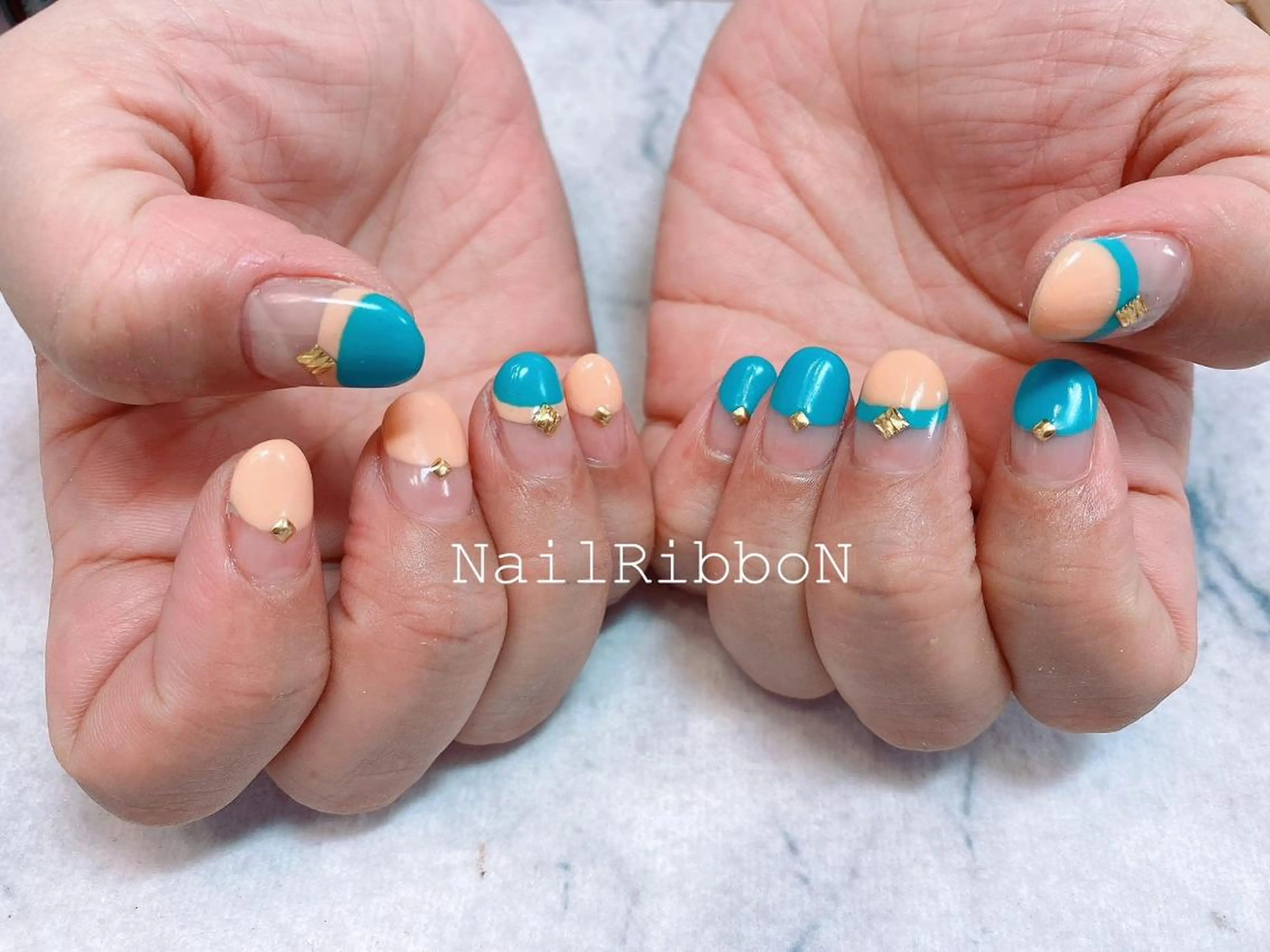 ネイル ネイルリボン 受付スタッフのネイルデザイン