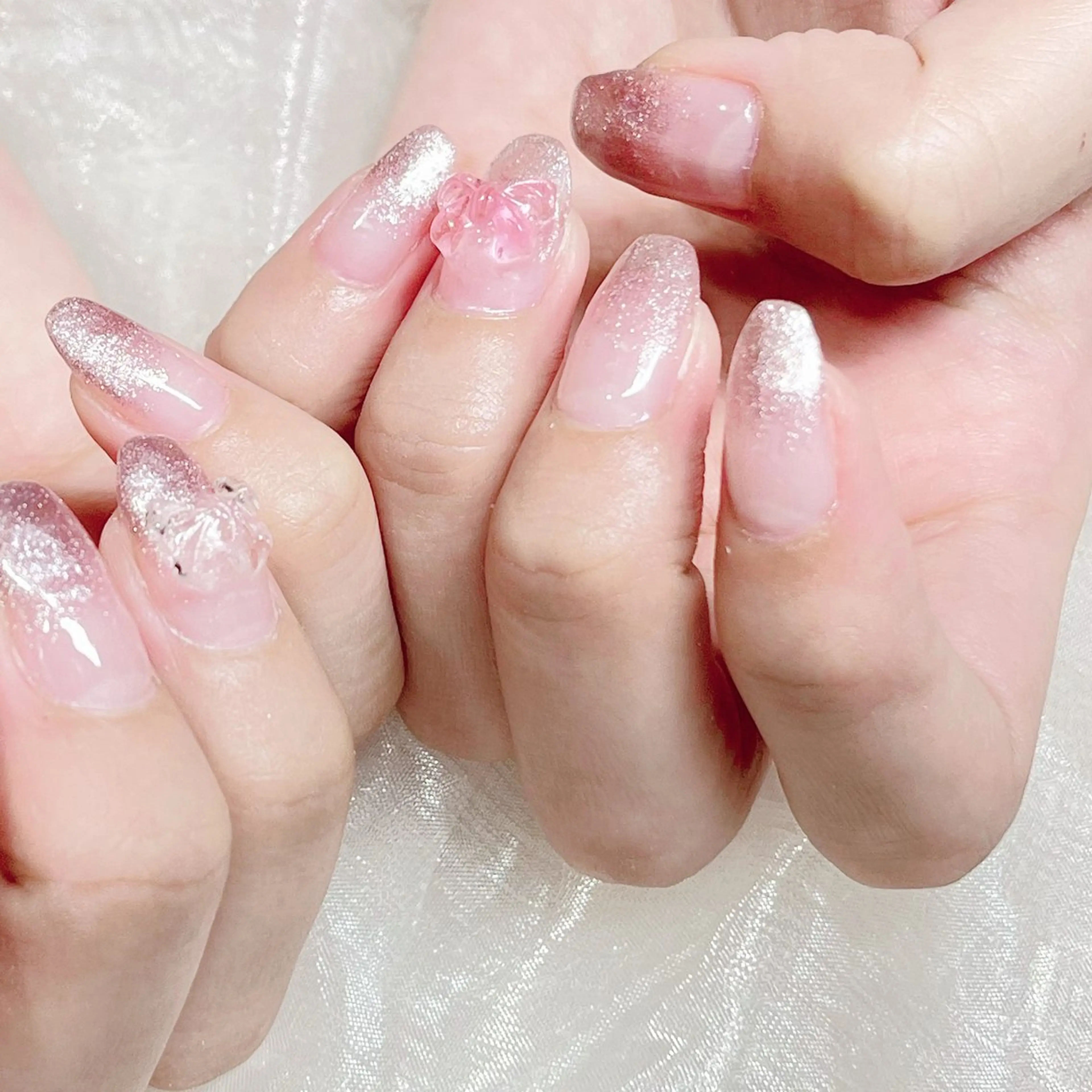 ネイル グラデーション 韓国ネイル オフィスネイル ピンク リボン n.hair所属・HTM _PUPULAのネイルデザイン