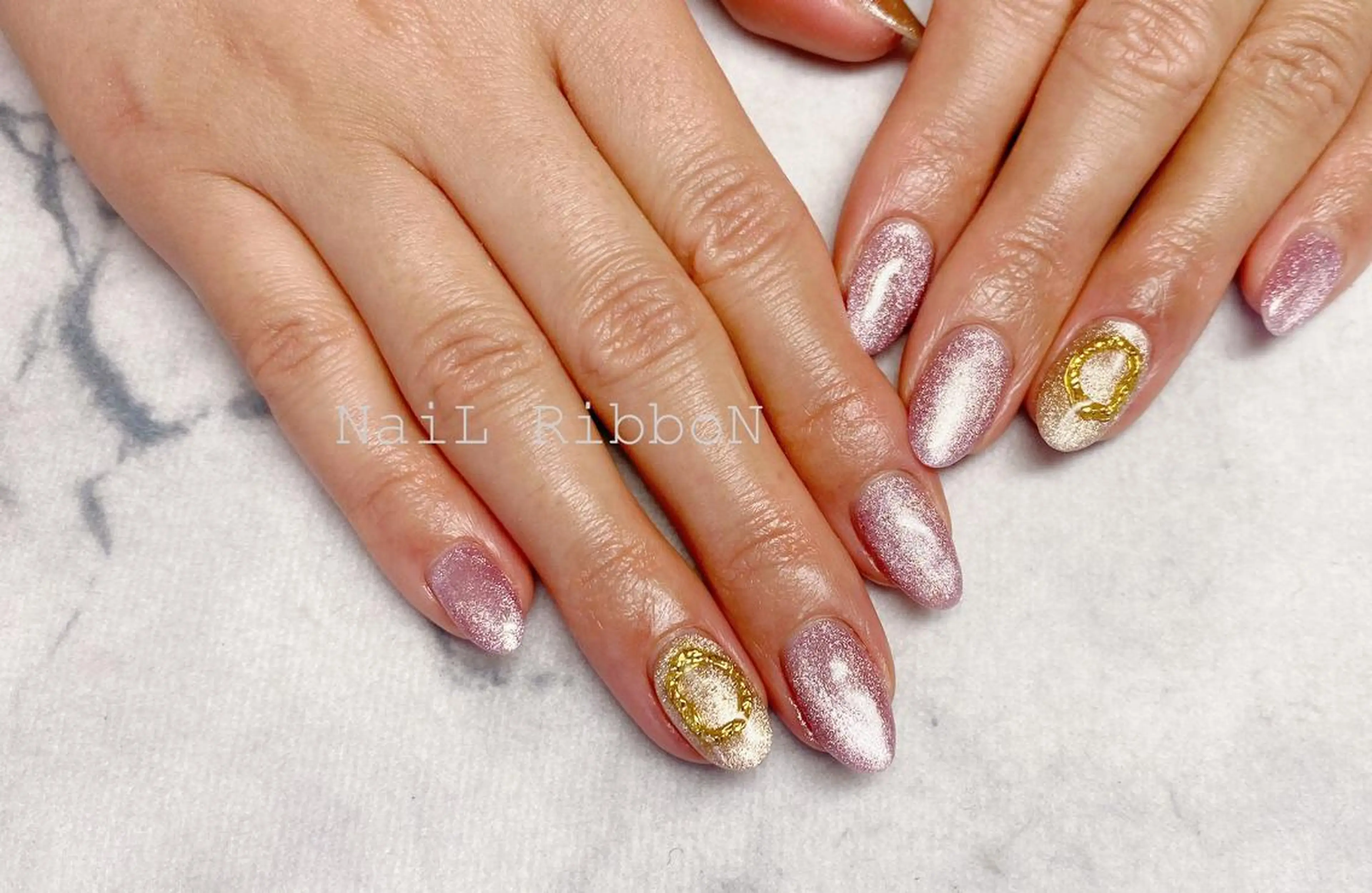 ネイル ネイルリボン 受付スタッフのネイルデザイン