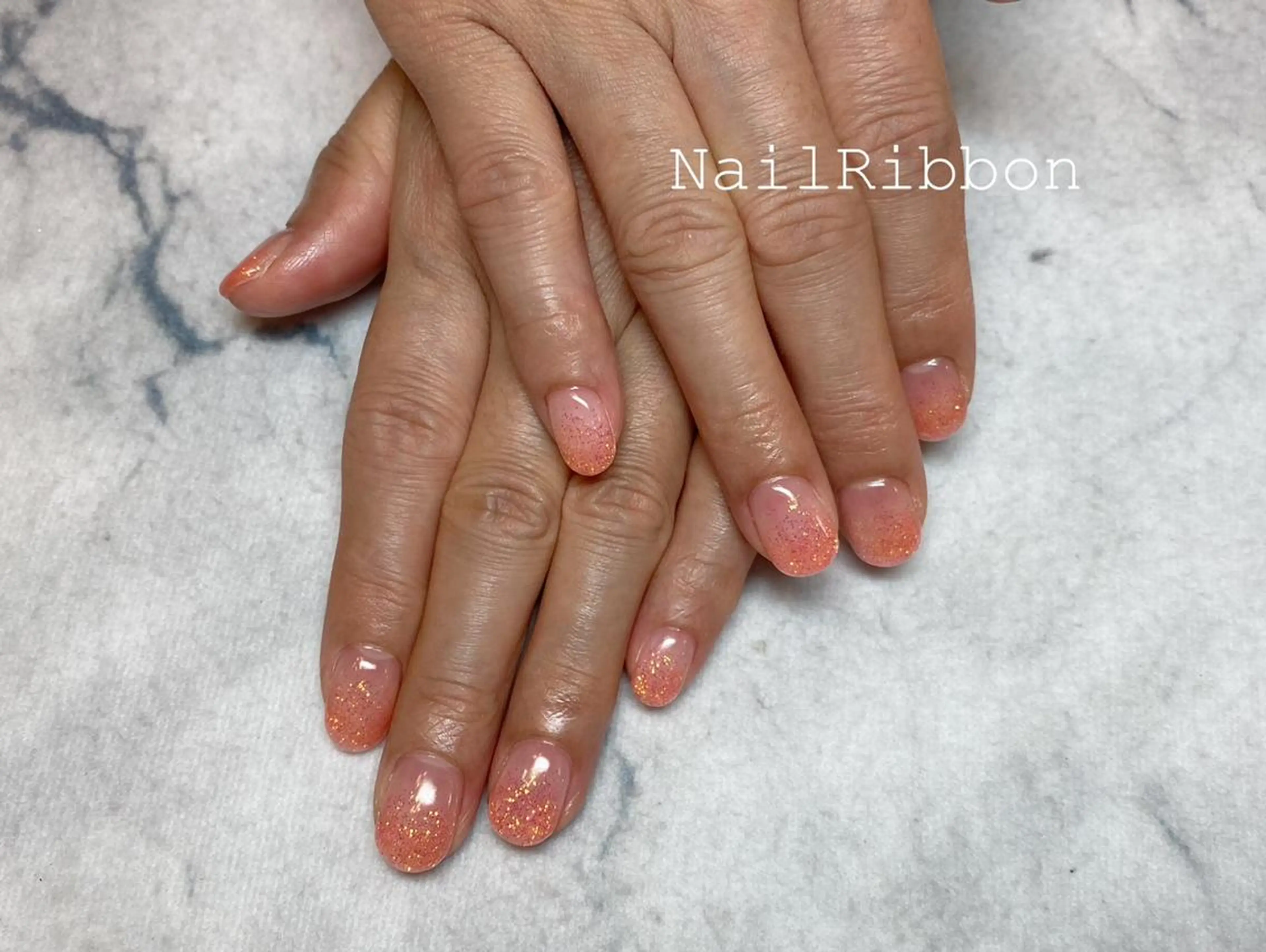 ネイル ネイルリボン 受付スタッフのネイルデザイン