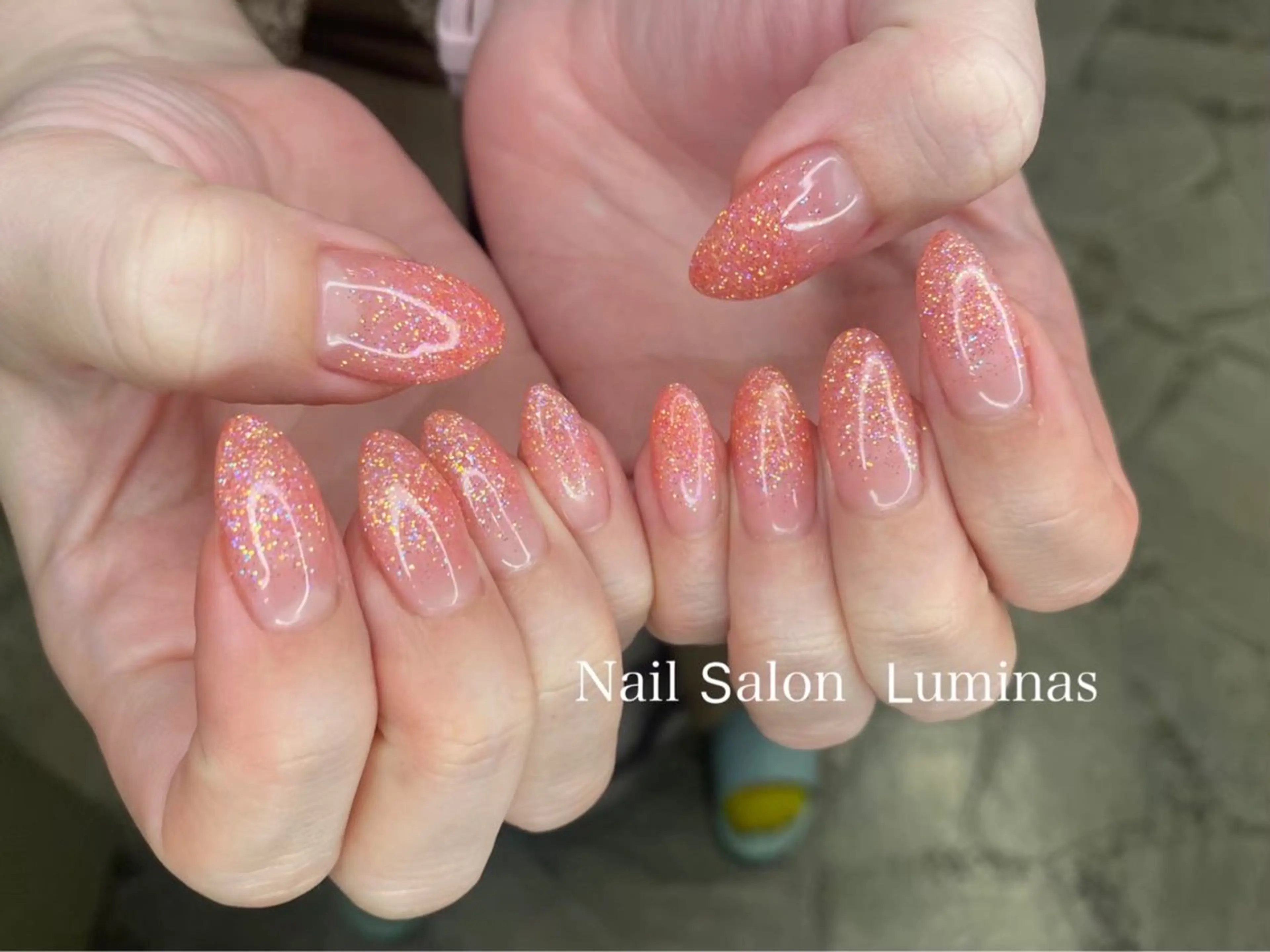 ネイル グラデーション キラキラネイル ラメ(グリッター) ラメグラデーション オレンジ ハンドネイル ruffle Asukaのネイルデザイン