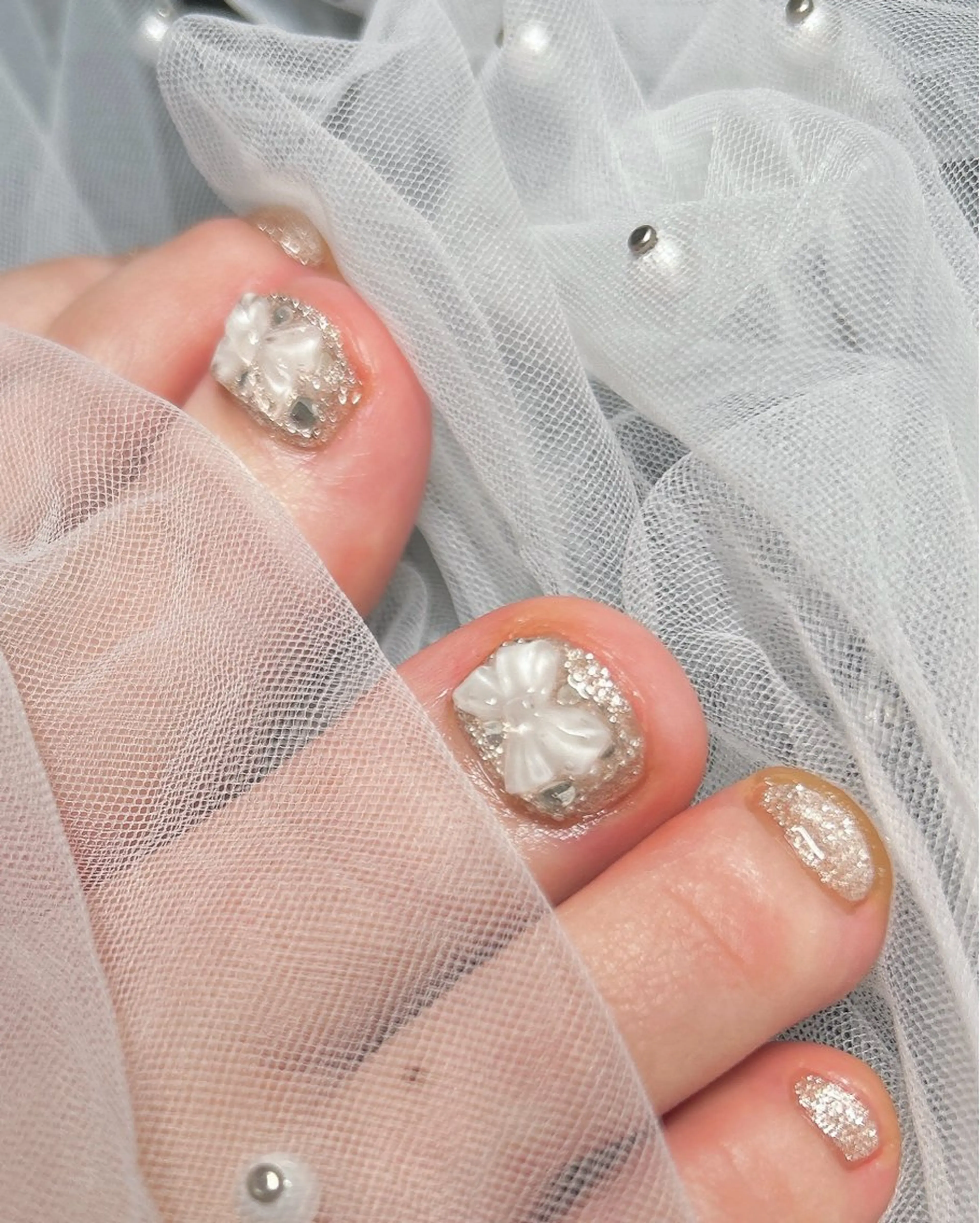 ネイル クリアネイル フットネイル ラメ(グリッター) リボン フットネイル ten nail salon　かえでのネイルデザイン