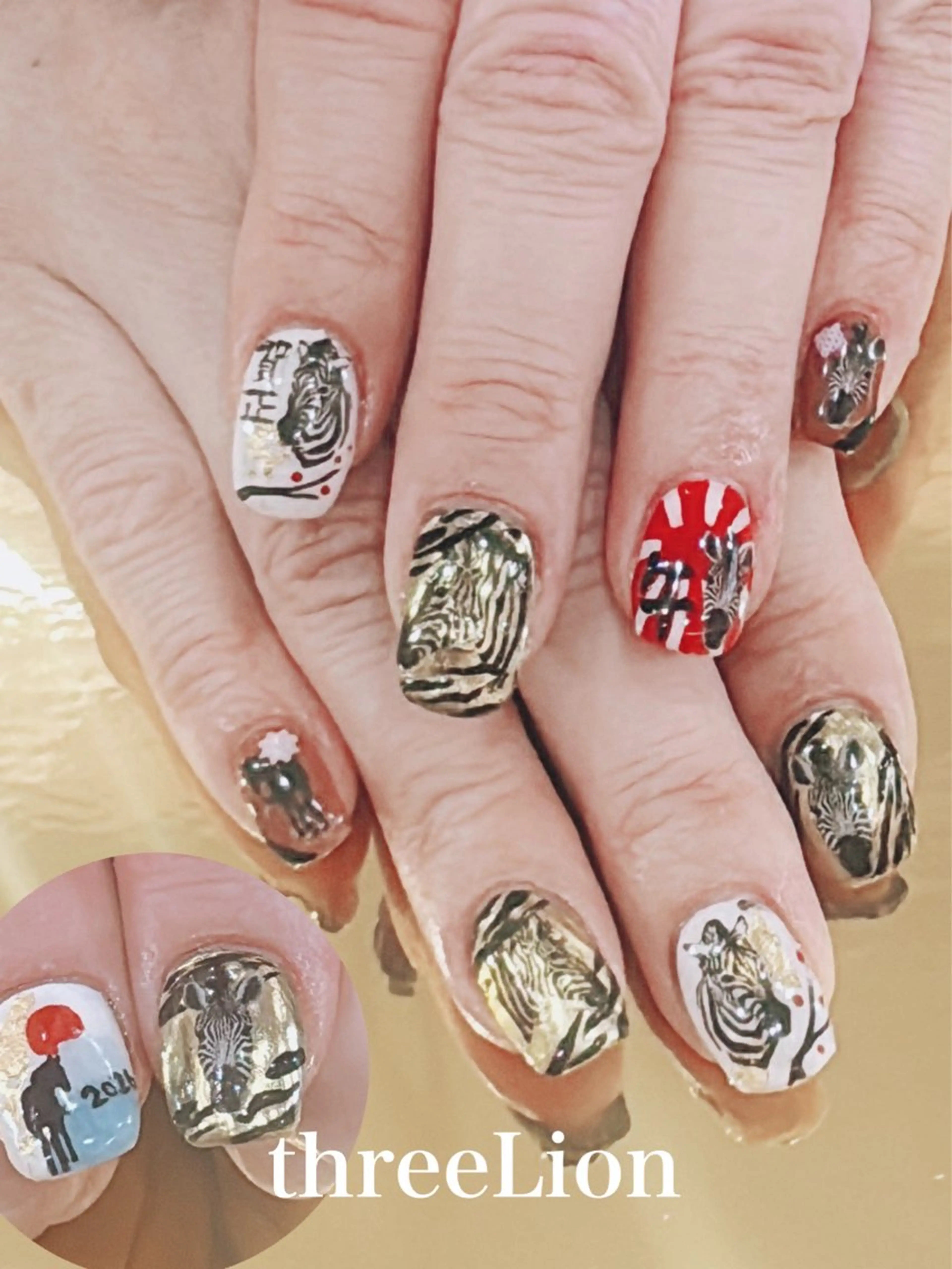 ネイル アニマル柄 ゴールド ハンドネイル threeLion　ネイル&アイラッシュサロン所属・threeLion ネイル&アイラッシュのマツエク・マツパデザイン
