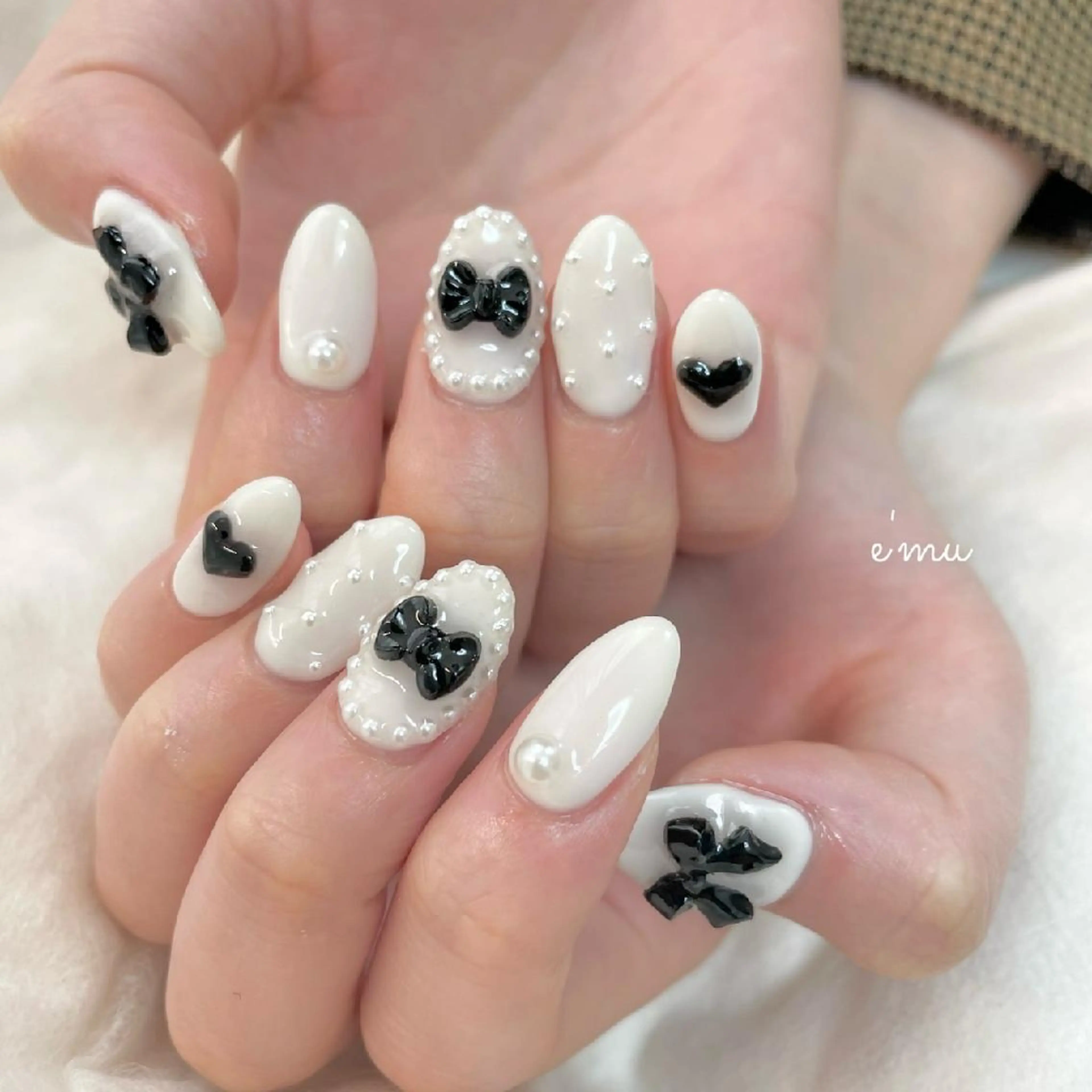 ネイル ガーリー リボン nail salon e'mu💐のネイルデザイン