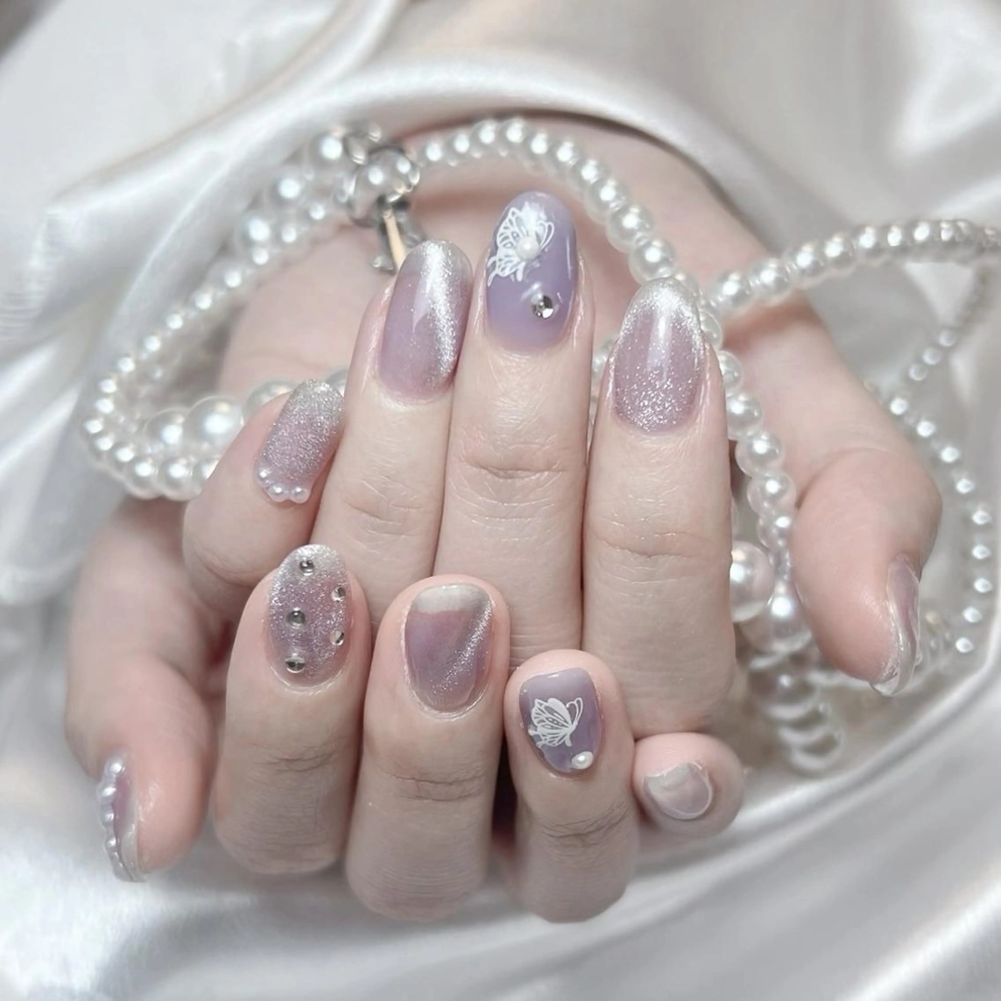 ネイル RAFFINE 月🦋🩵のネイルデザイン