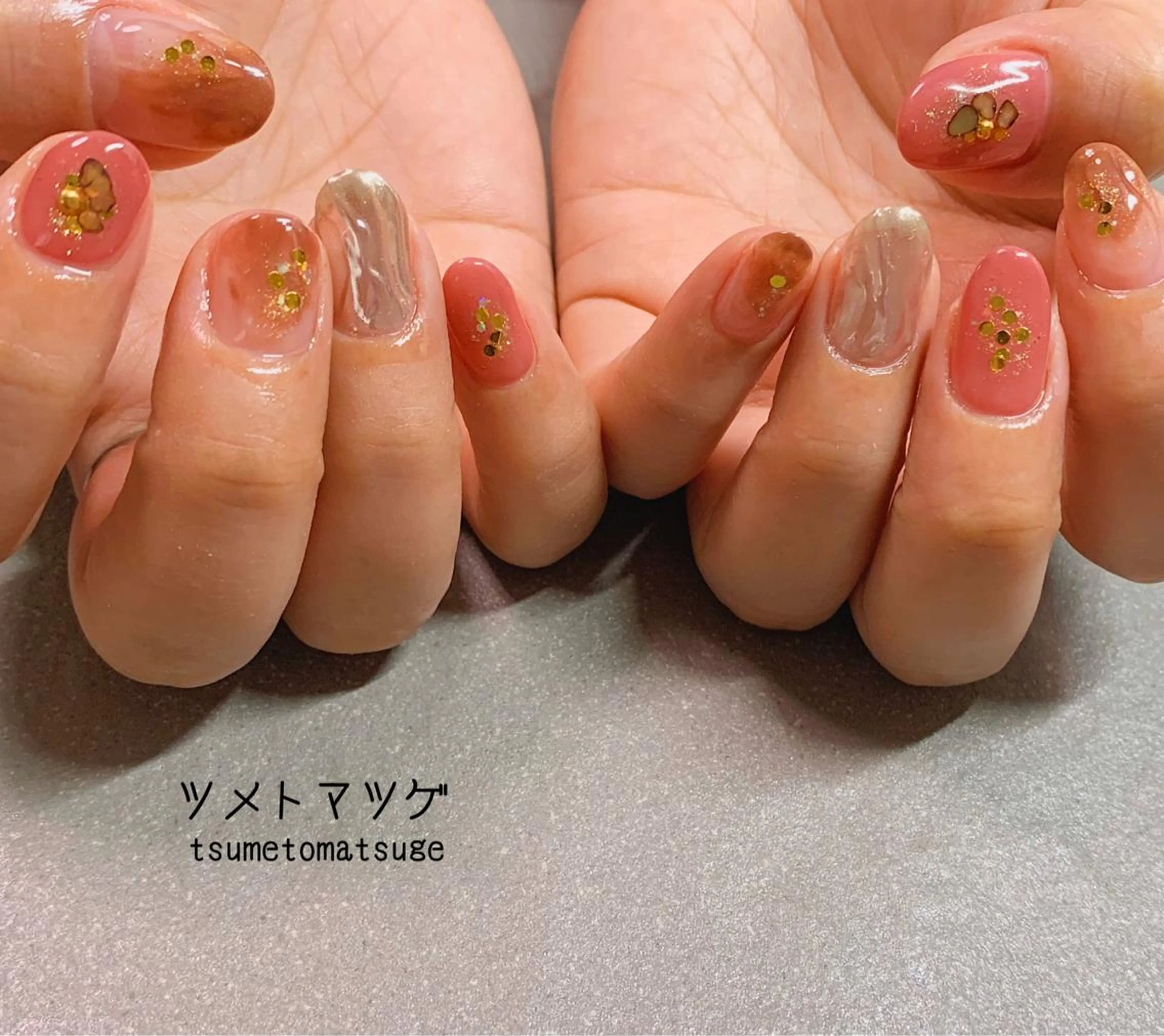 ミディアム ネイル アートネイル ツメトマツゲ .のネイルデザイン