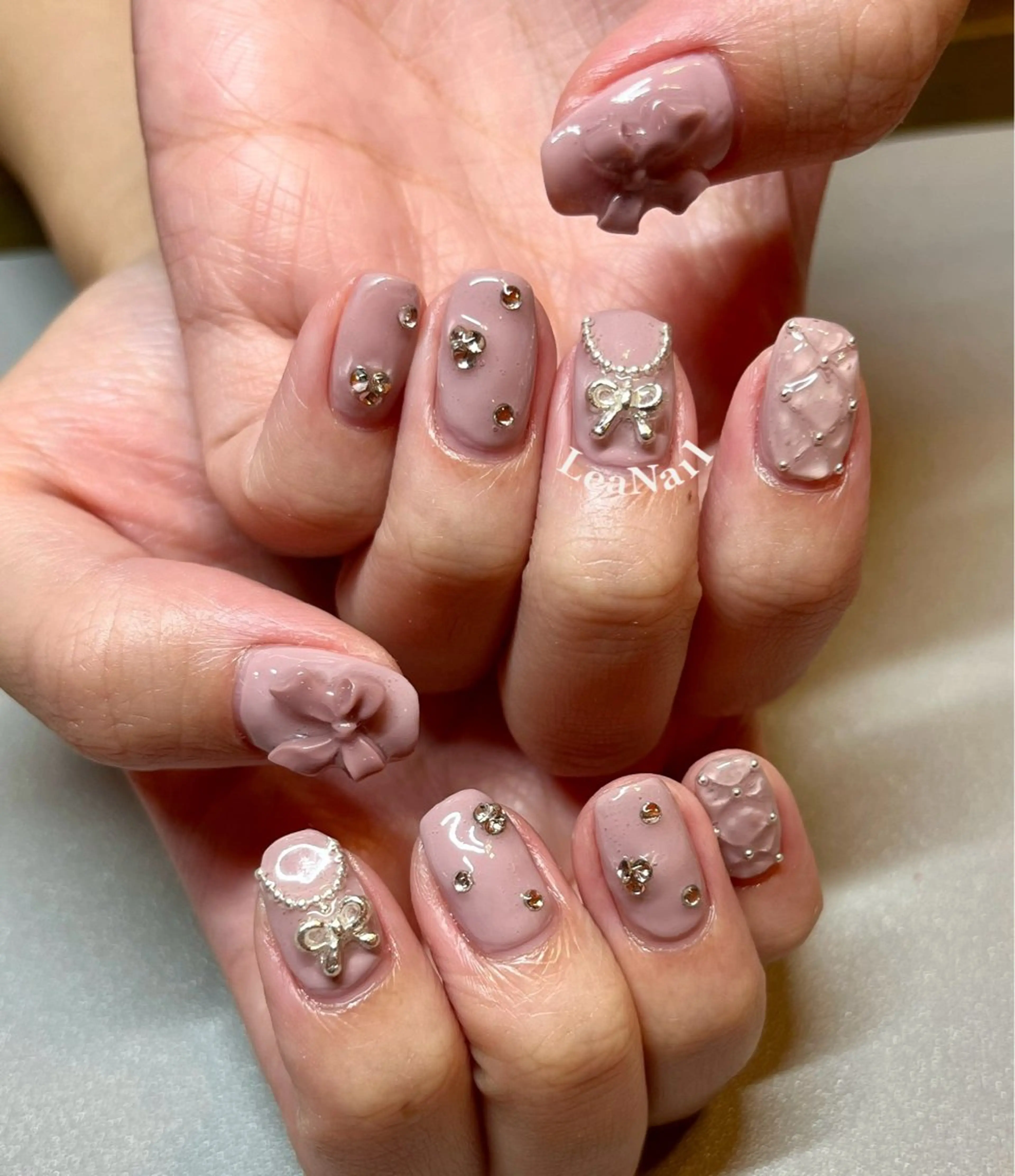 ネイル ピンク ぷっくりネイル リボン Lea Nailのネイルデザイン