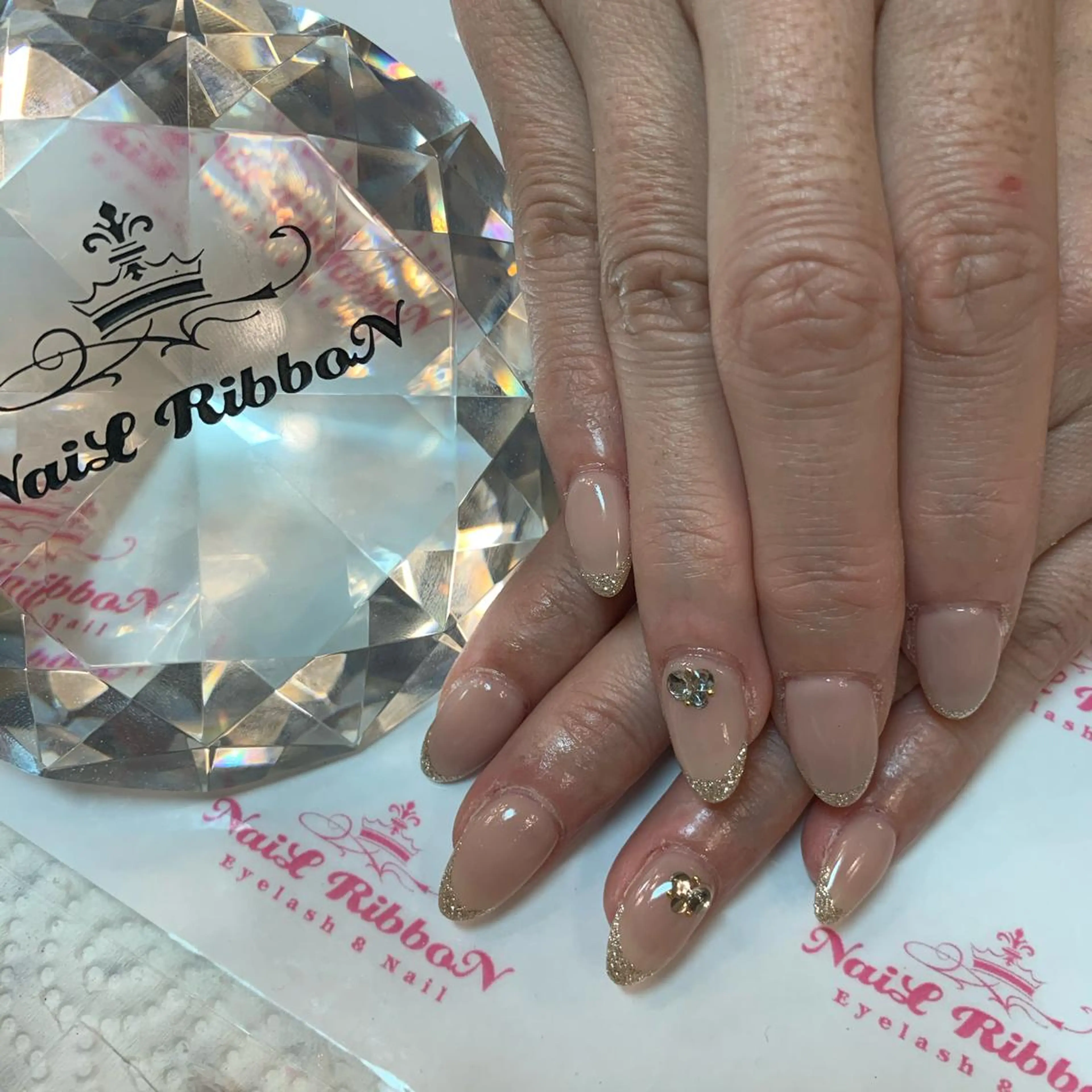 ネイル ネイルリボン 受付スタッフのネイルデザイン