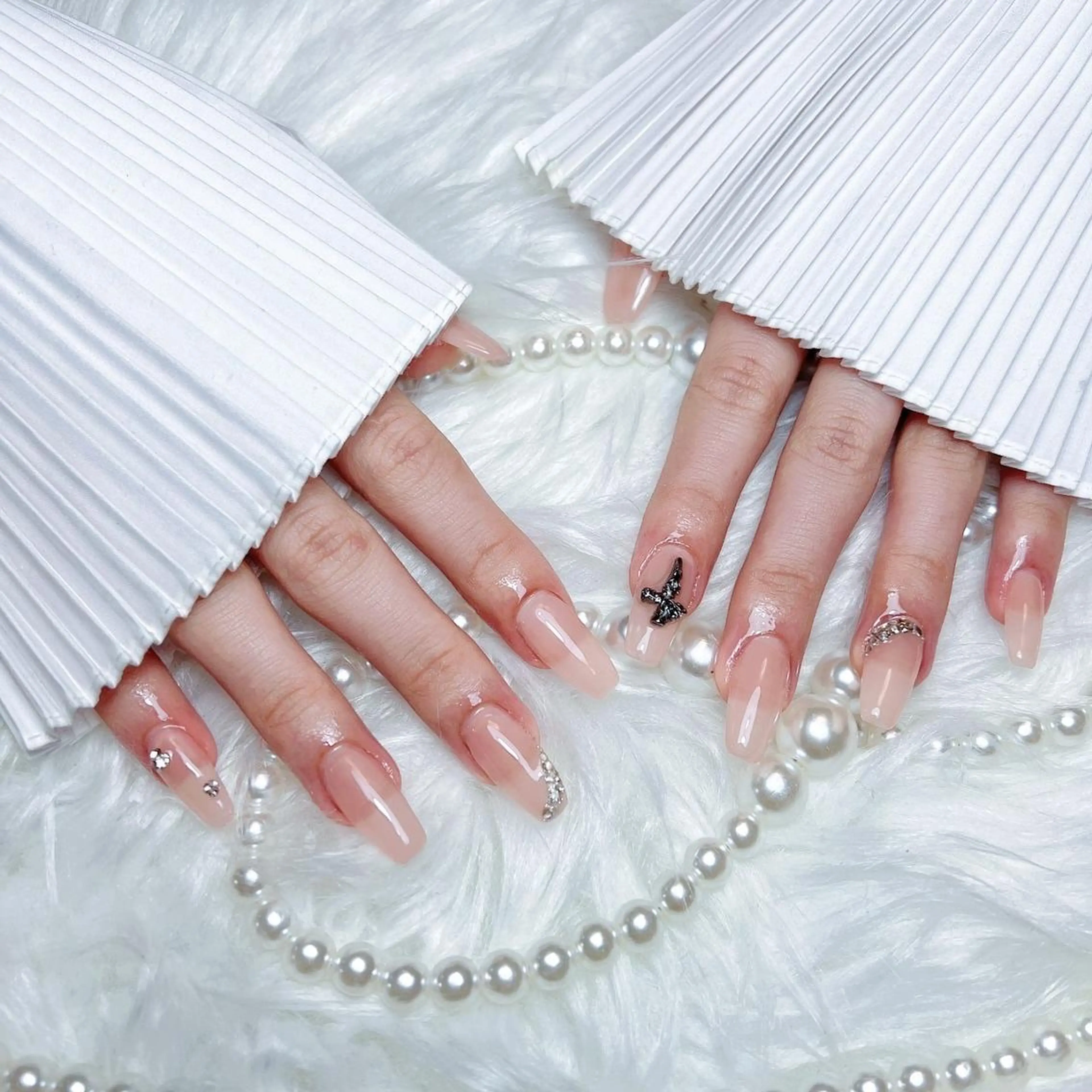 ネイル RAFFINE 月🦋🩵のネイルデザイン