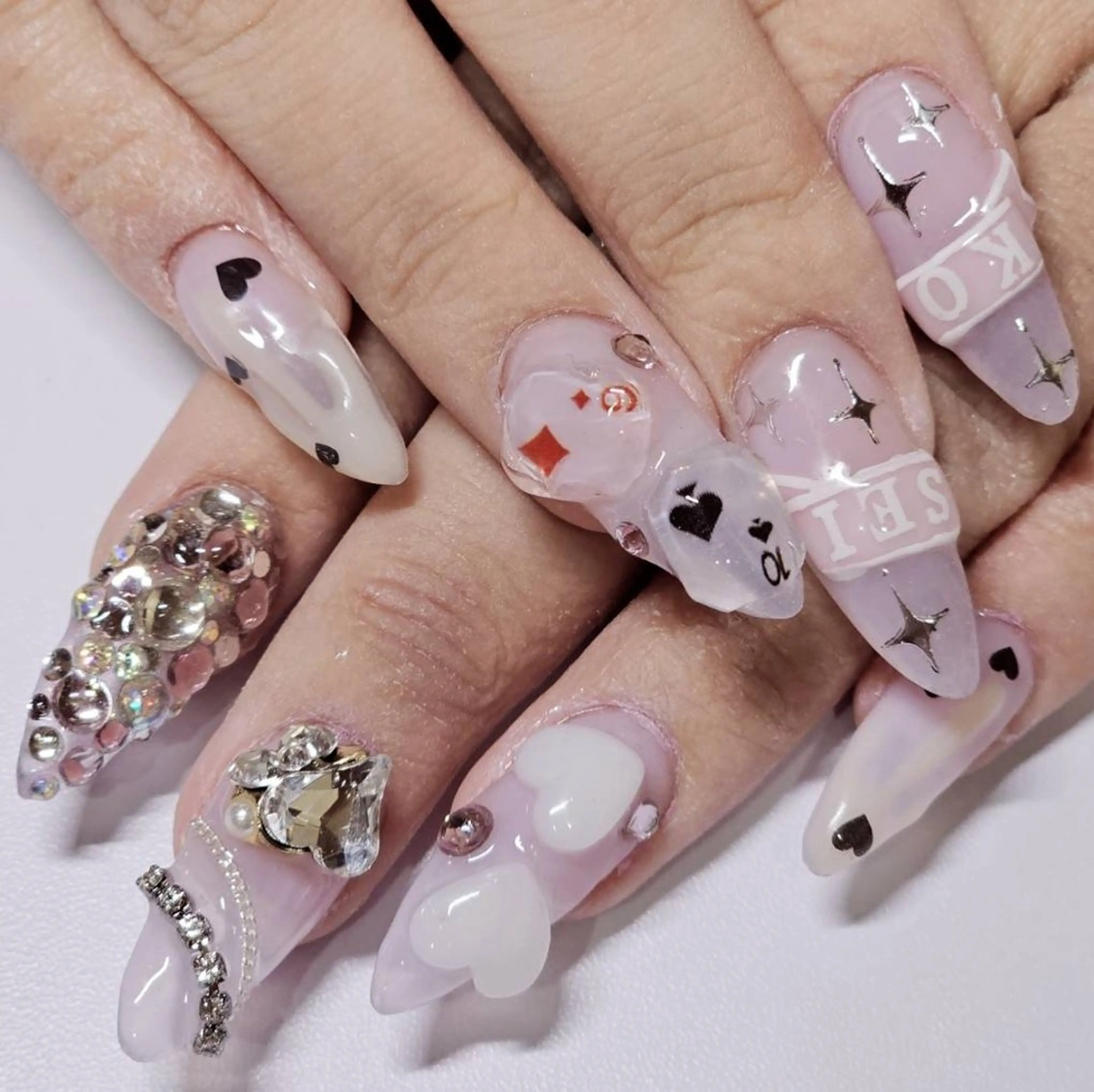 ネイル アートネイル キラキラネイル ワンカラーネイル ホワイト ハンドネイル よしだ ひろきのネイルデザイン