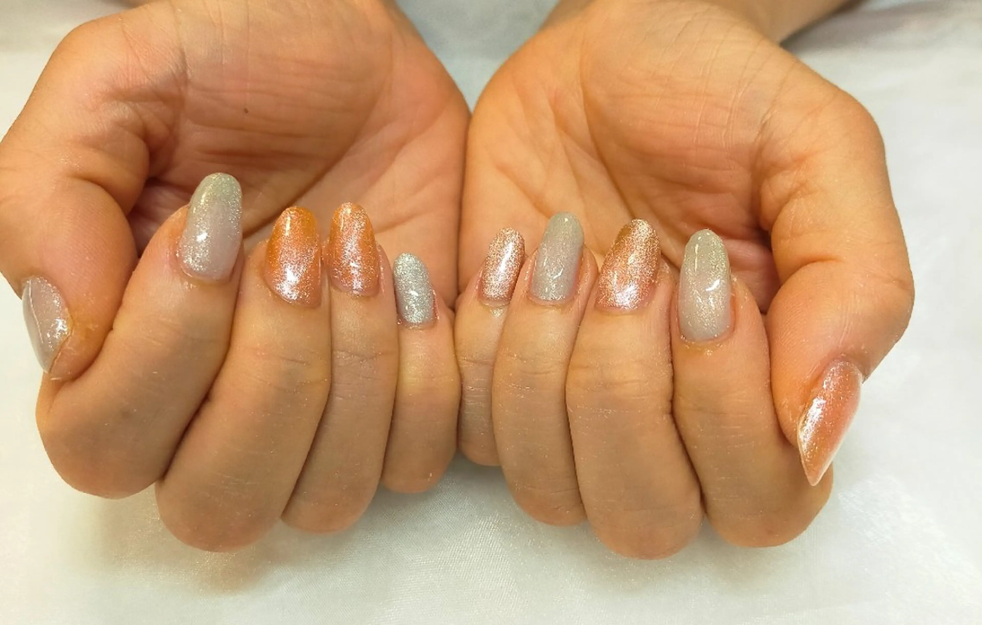 ネイル キラキラネイル マグネットネイル オレンジ シルバー maruyasu. yのネイルデザイン