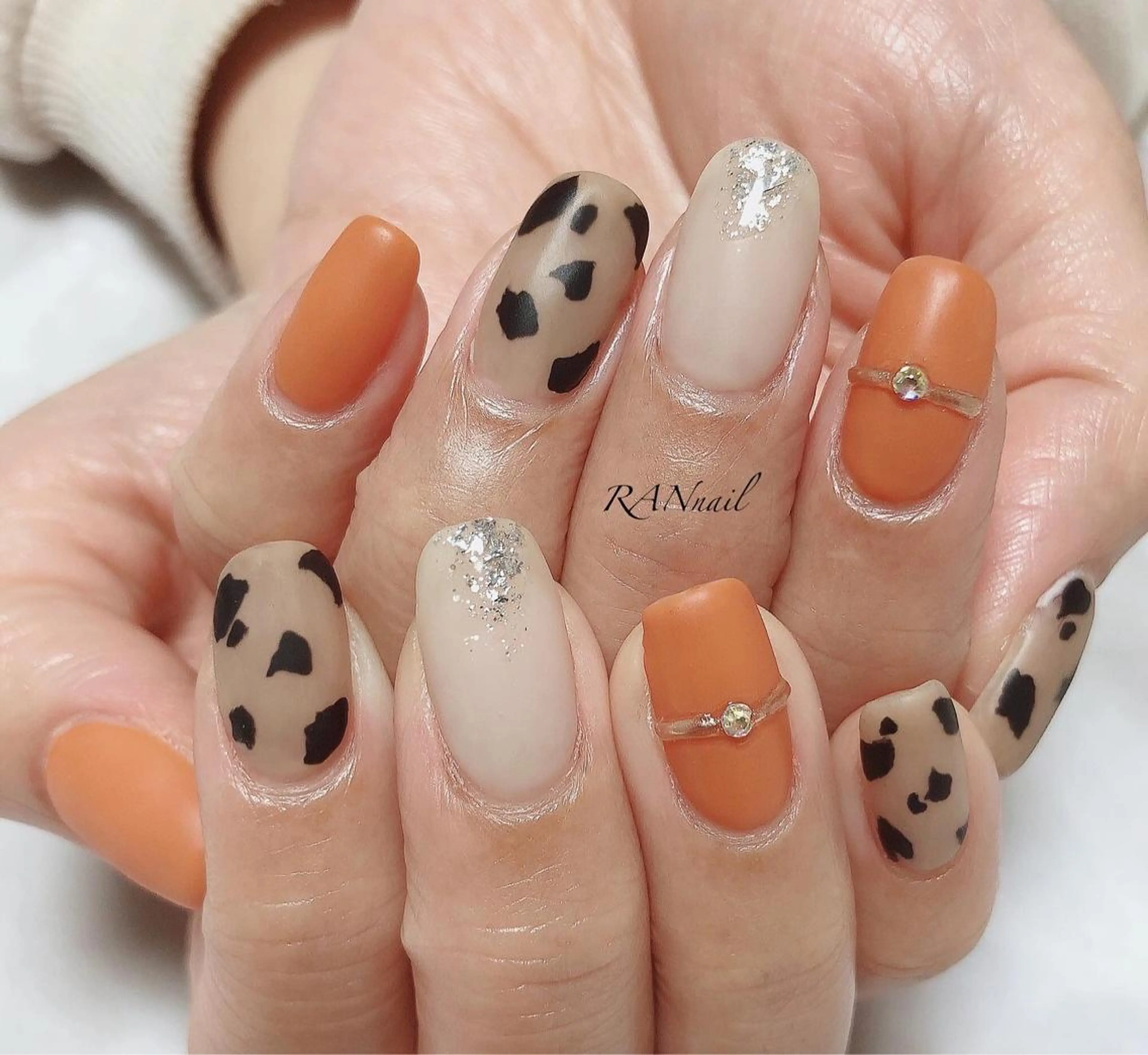 ネイル アニマル柄 オフィスネイル オレンジ 冬ネイル RAN nail 〜ランネイル〜所属・RAN nailのネイルデザイン