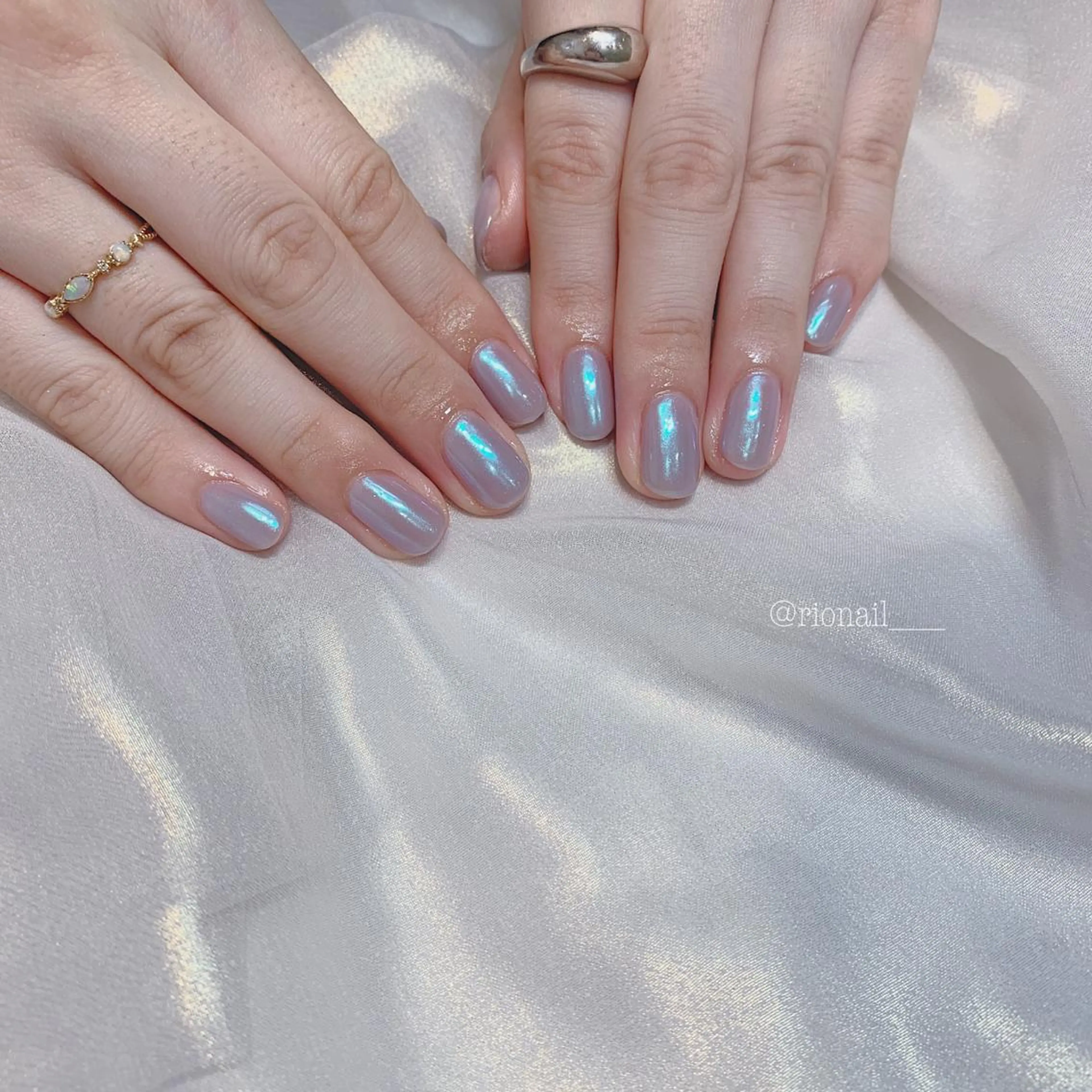 ネイル オーロラネイル 𝘙𝘪𝘰𝘯𝘢 ...🕯🤍のネイルデザイン