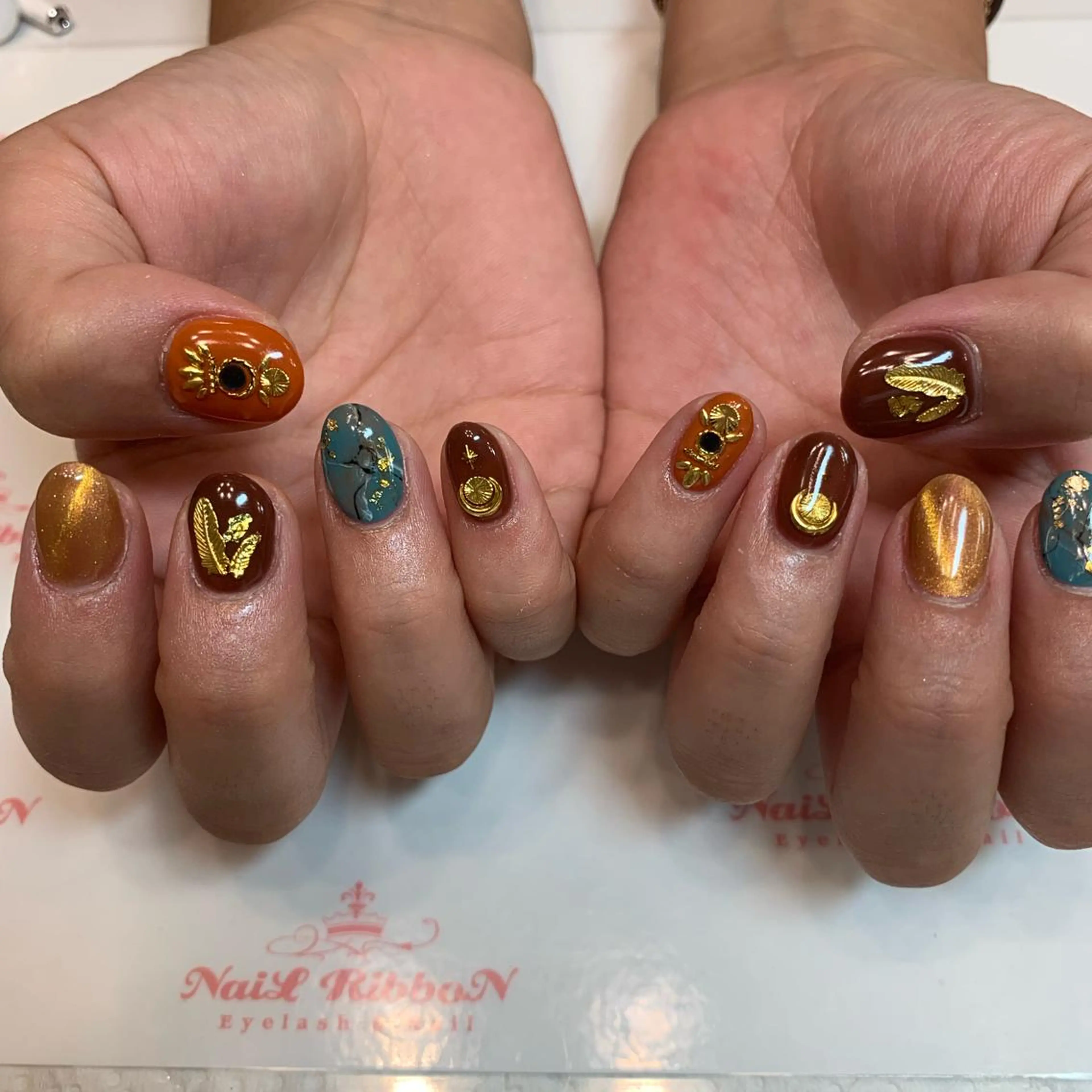 ネイル ネイルリボン 受付スタッフのネイルデザイン