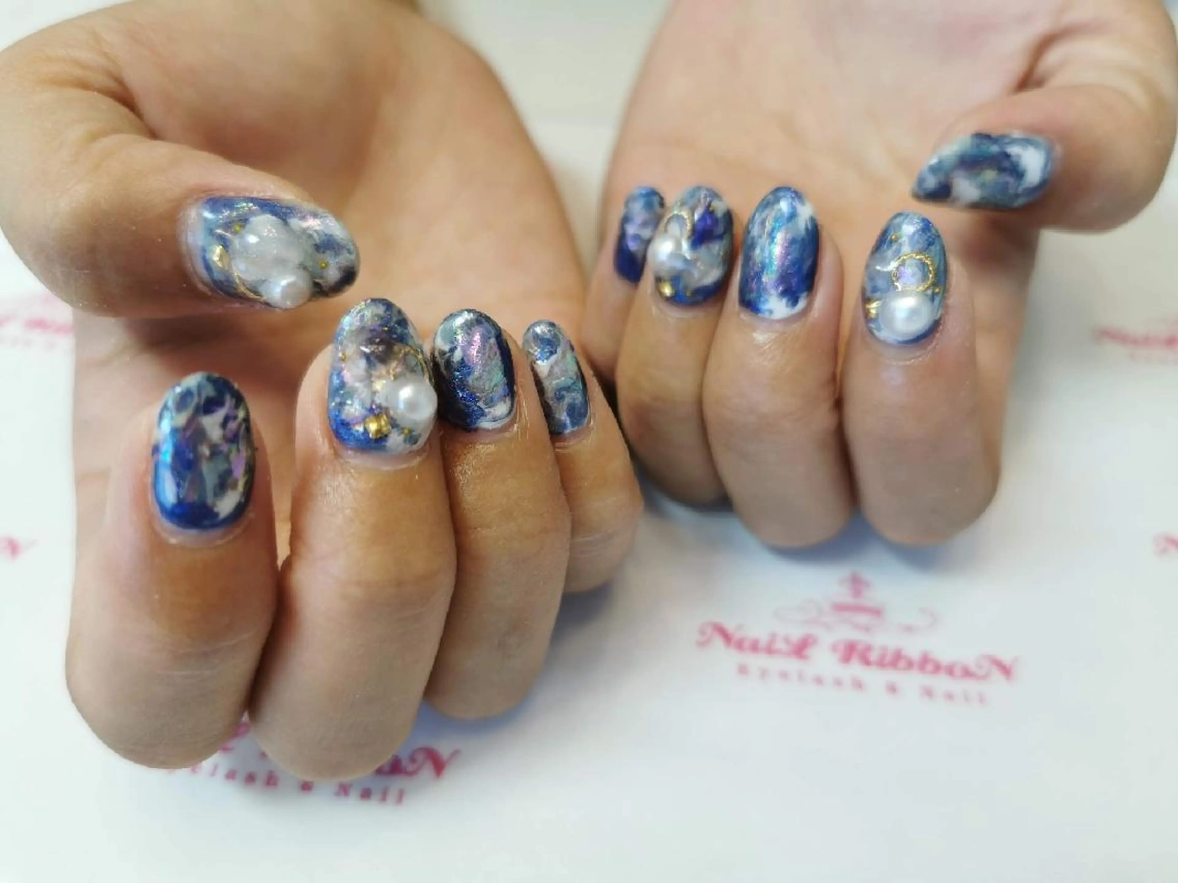 ネイル ネイルリボン 受付スタッフのネイルデザイン