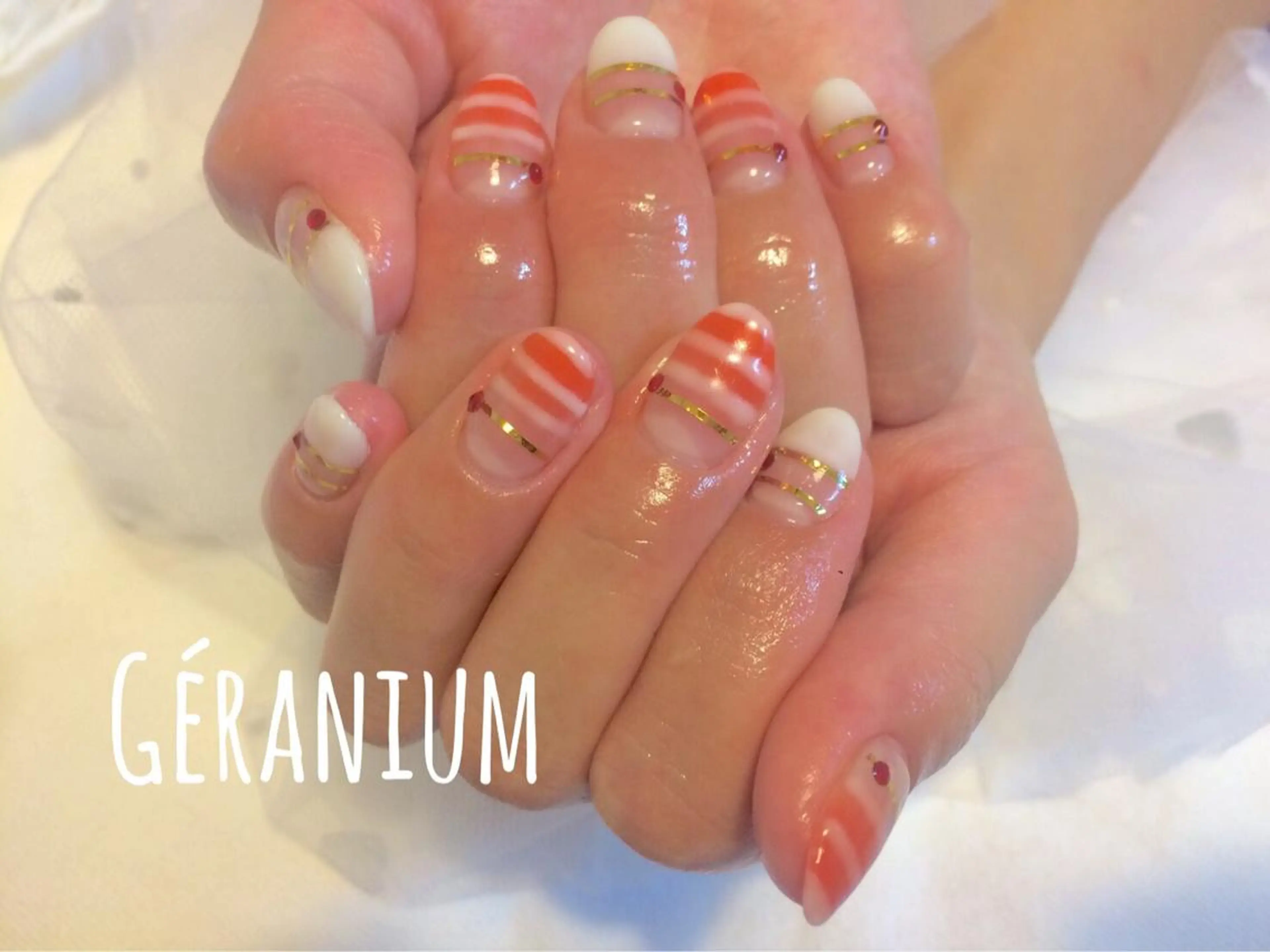 ネイル オレンジ GéRanium Harukaのネイルデザイン