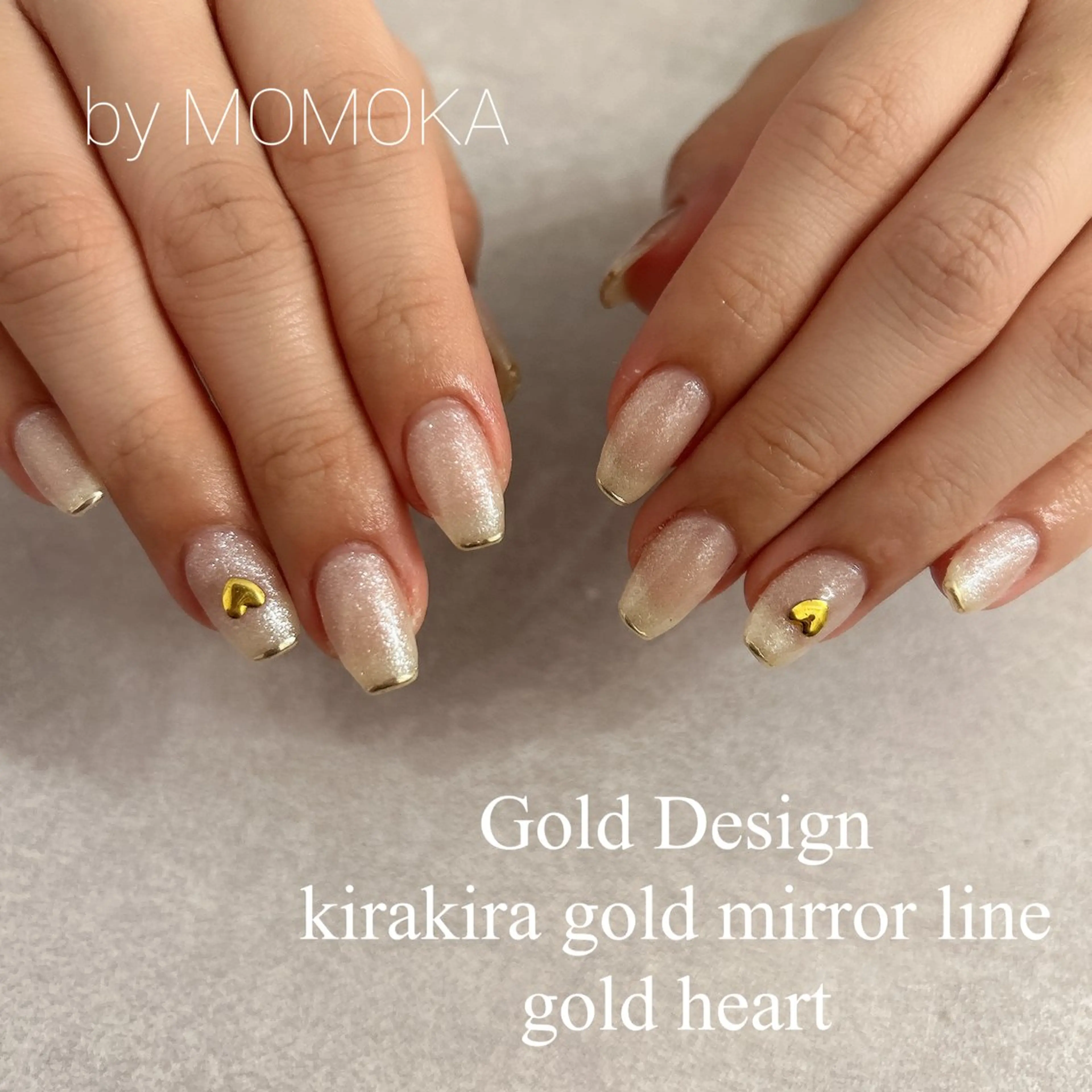 ネイル ゴールド キラキラネイル ミラーネイル ホワイト ハンドネイル momoka_nails所属・Momo Nailsのネイルデザイン
