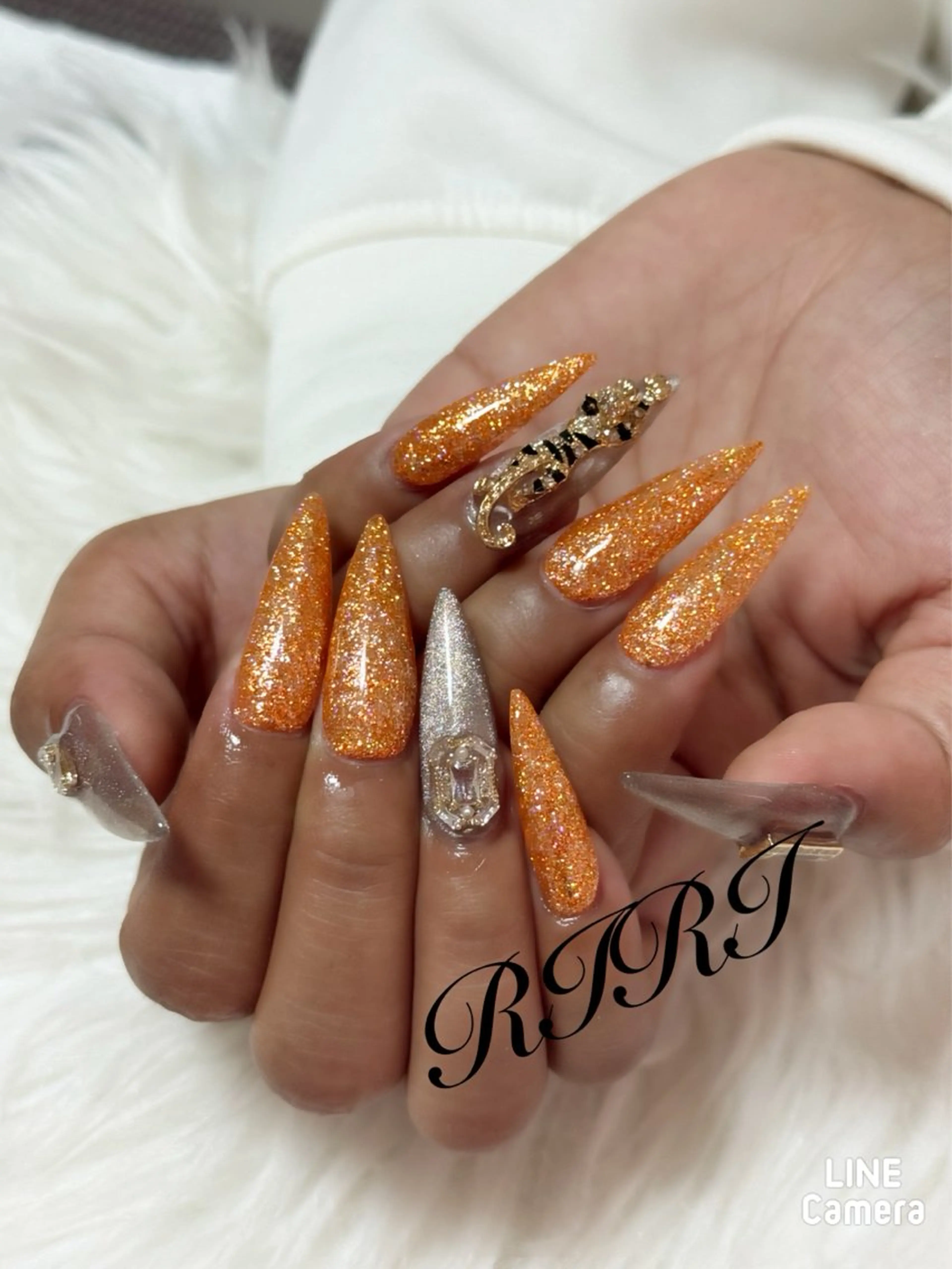 ネイル ジェルネイル ラメ(グリッター) ロングネイル オレンジ スカルプネイル ハンドネイル riri オーナーのネイルデザイン