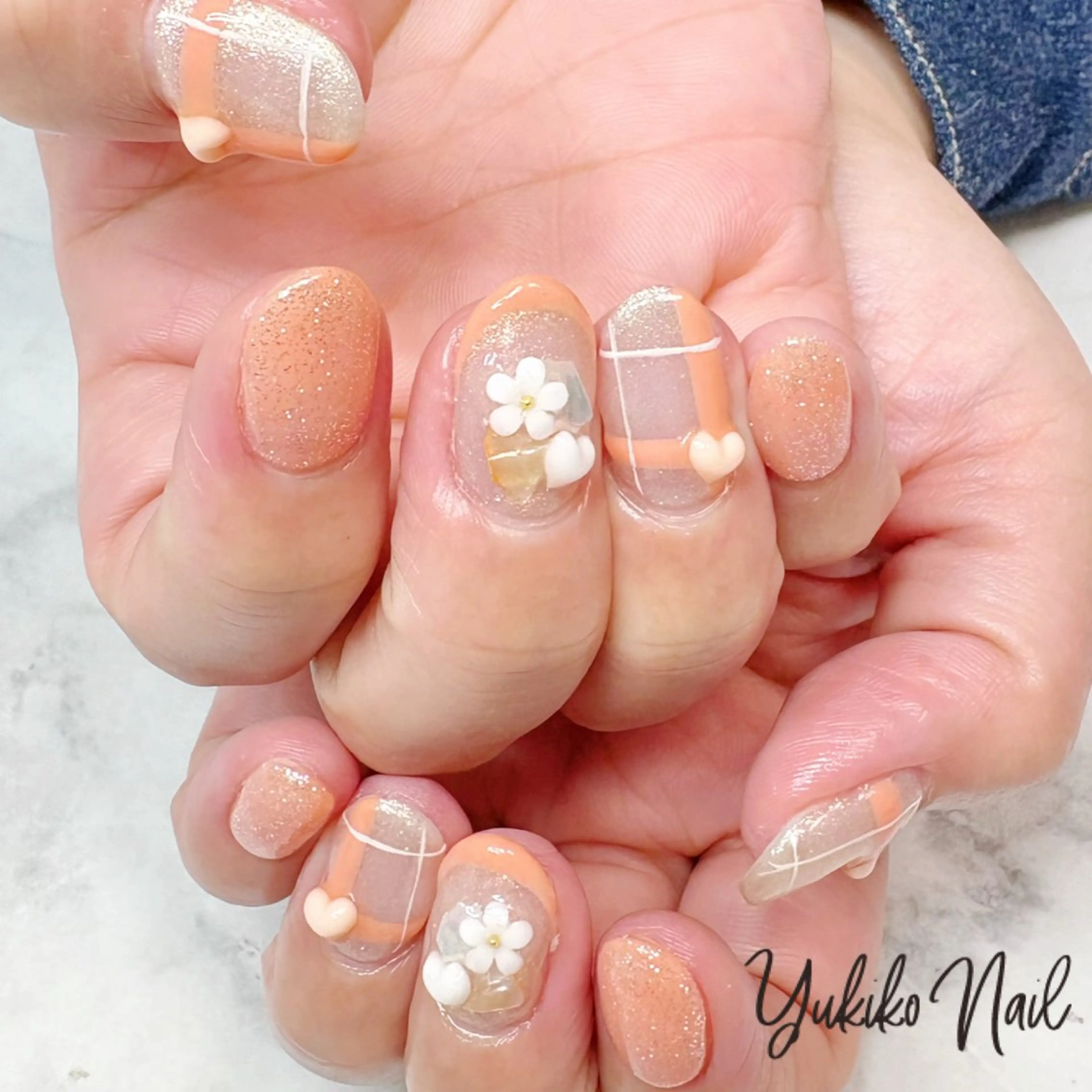 ネイル キラキラネイル オレンジ 春ネイル ハンドネイル ユキコ ネイルのネイルデザイン