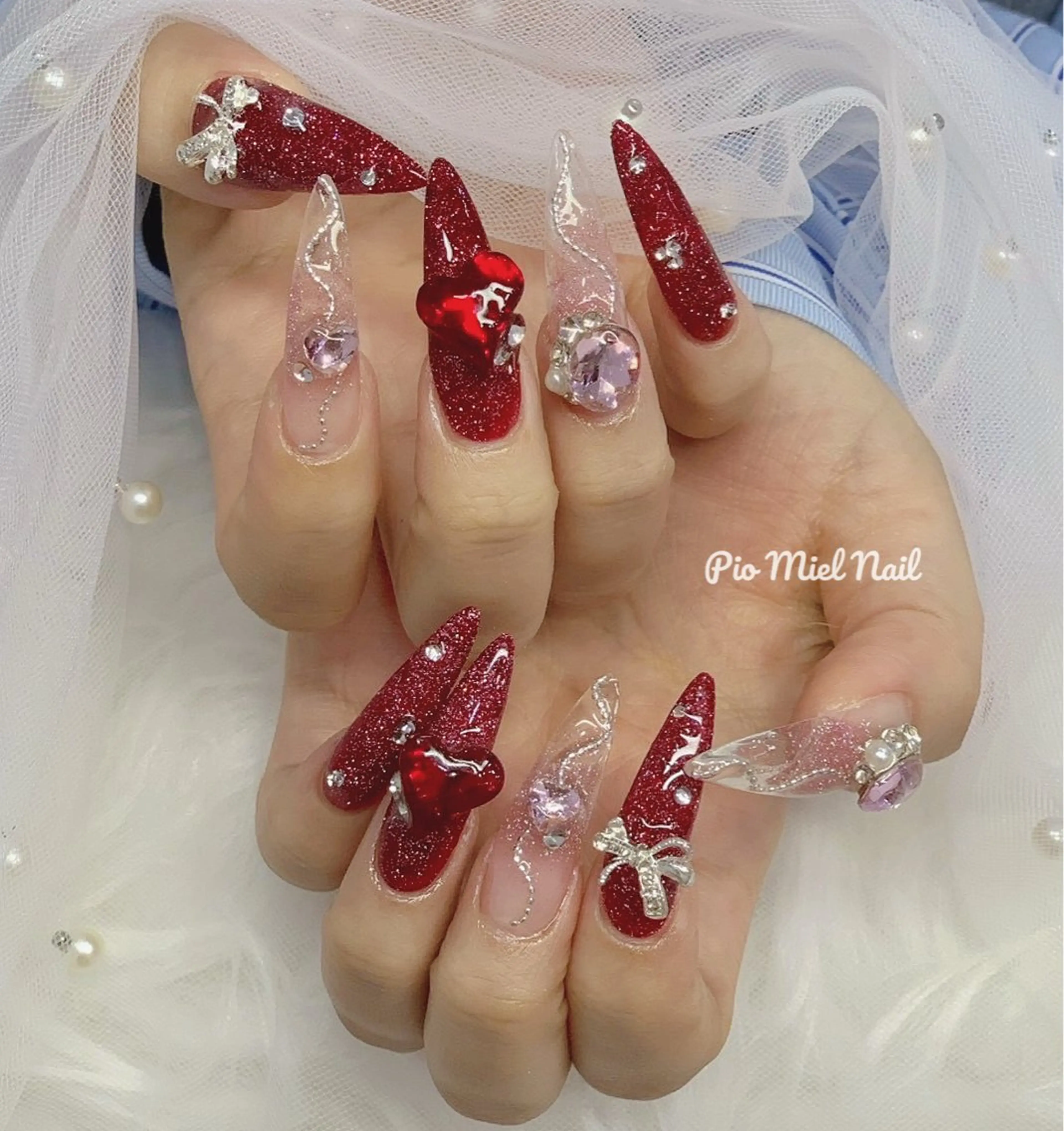 ロング ハンドネイル Pio Mielのネイルデザイン