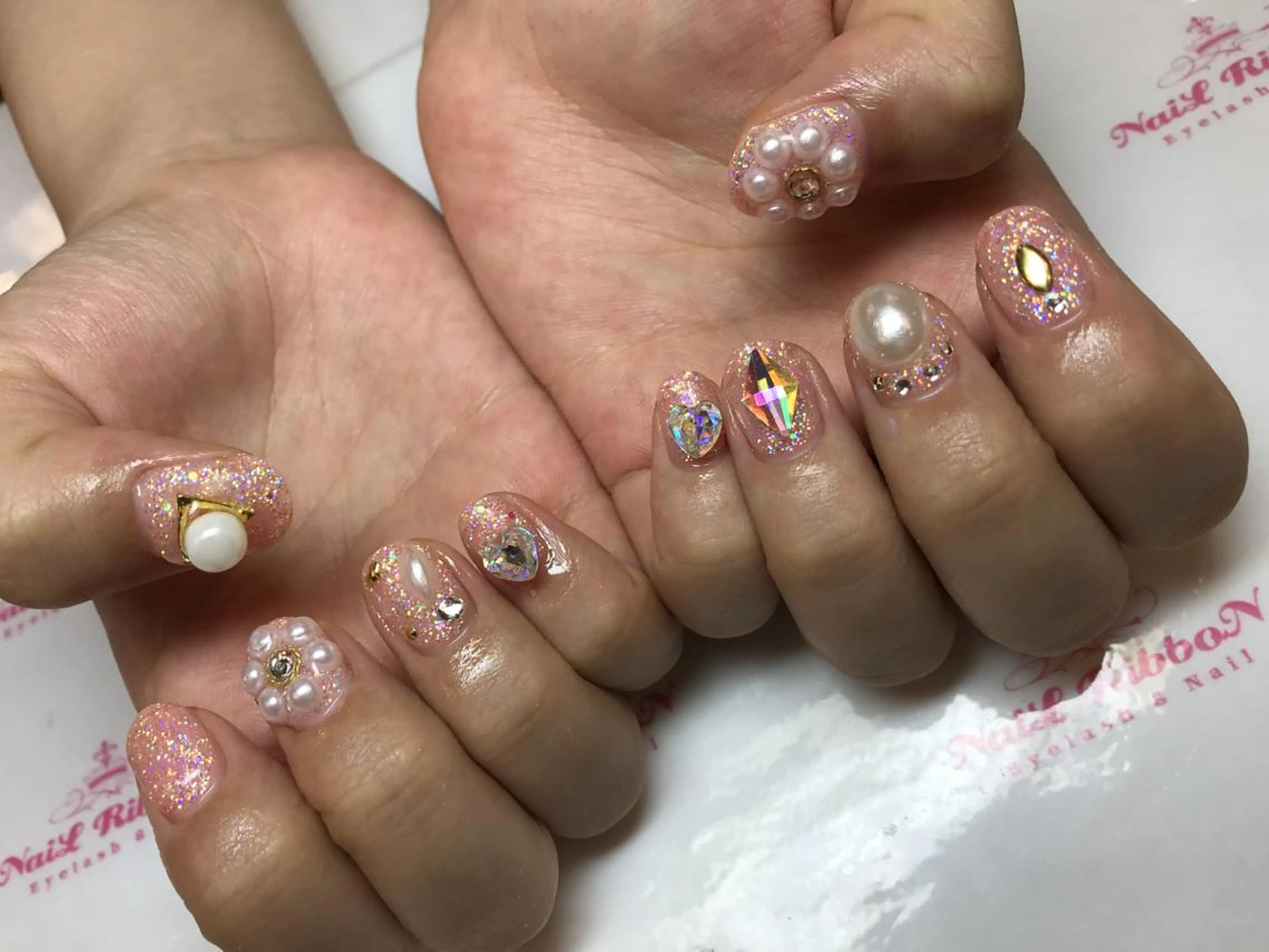 ネイル ネイルリボン 受付スタッフのネイルデザイン