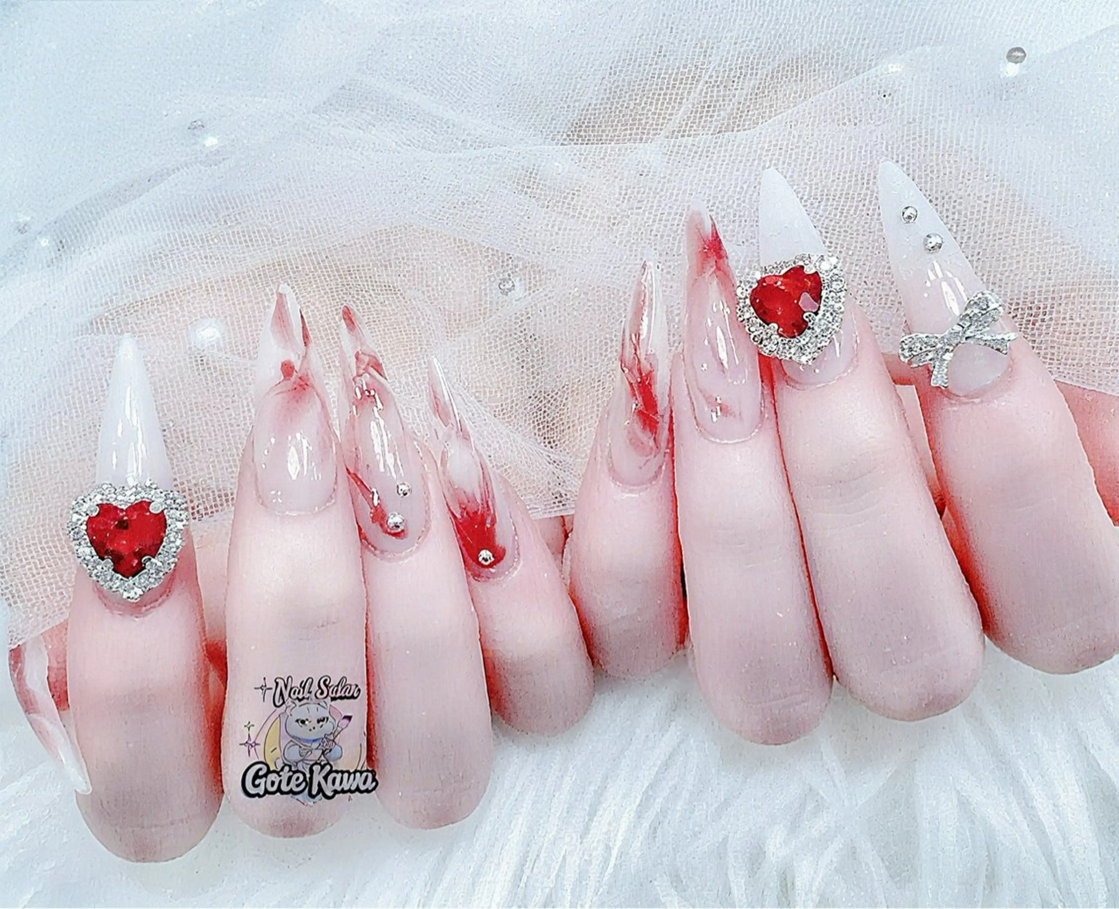 ネイル アートネイル 長さ出し キラキラネイル ピンク リボン ハンドネイル ハンドケア GOTE KAWA Nail Salon(ゴテかわ)所属・Gote Kawa nail salonのネイルデザイン