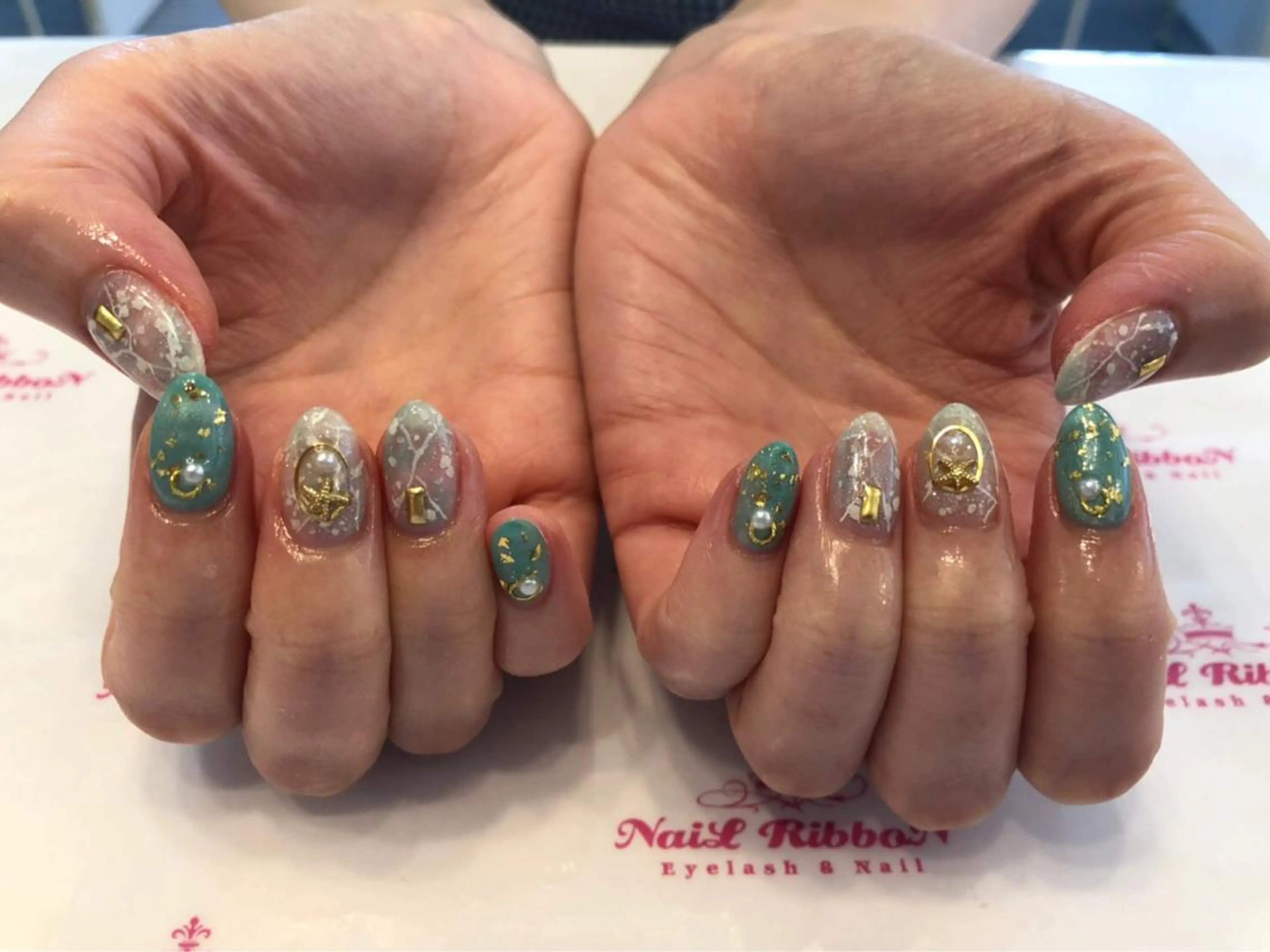 ネイル 春ネイル ネイルリボン 受付スタッフのネイルデザイン