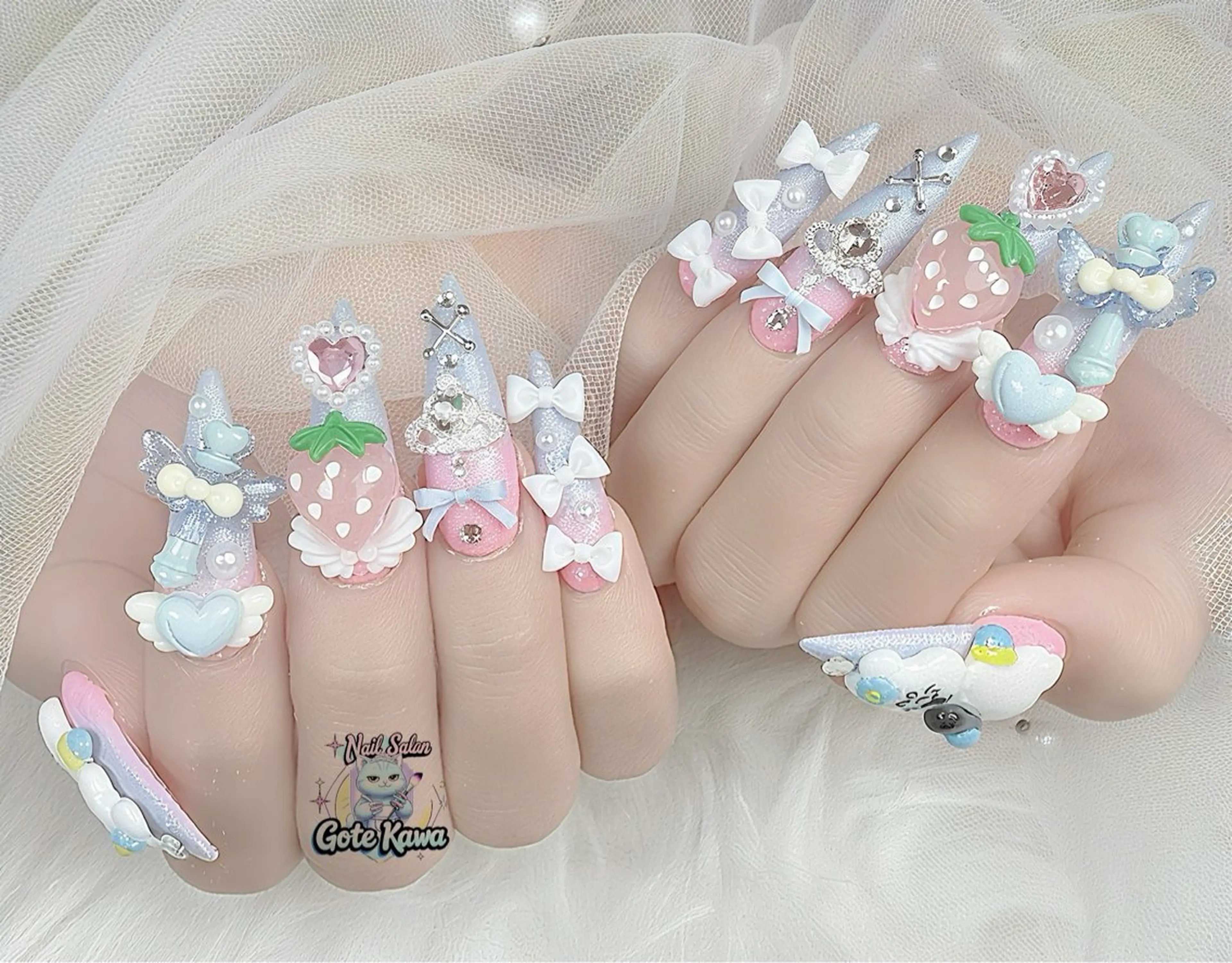 ネイル グラデーション ピンク リボン ハンドネイル ハンドケア GOTE KAWA Nail Salon(ゴテかわ)所属・Gote Kawa nail salonのネイルデザイン