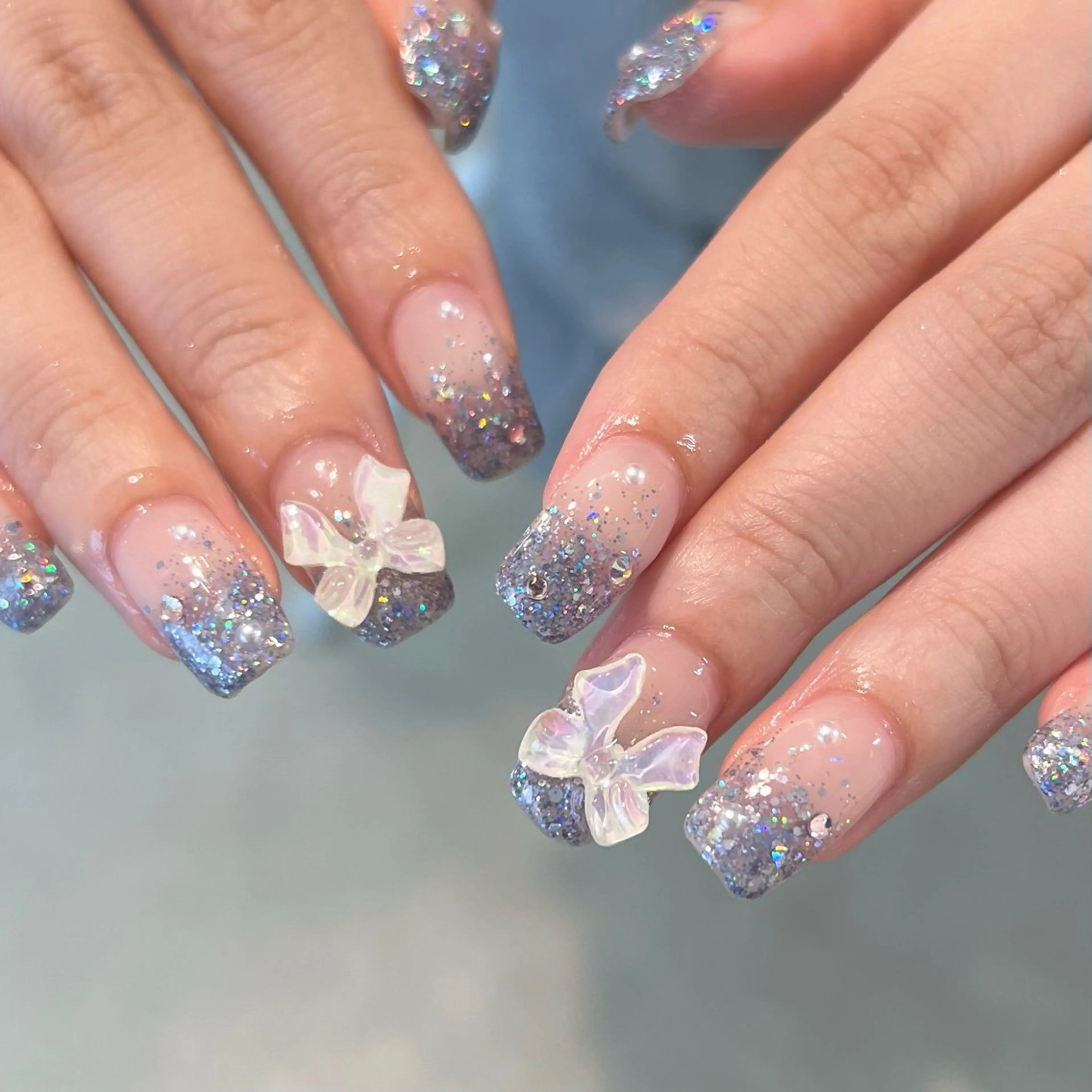 ネイル リボン ハンドネイル sio.nail&eyebrow salon shimokitazawa2号店所属・nailist mana𖤐´-のネイルデザイン