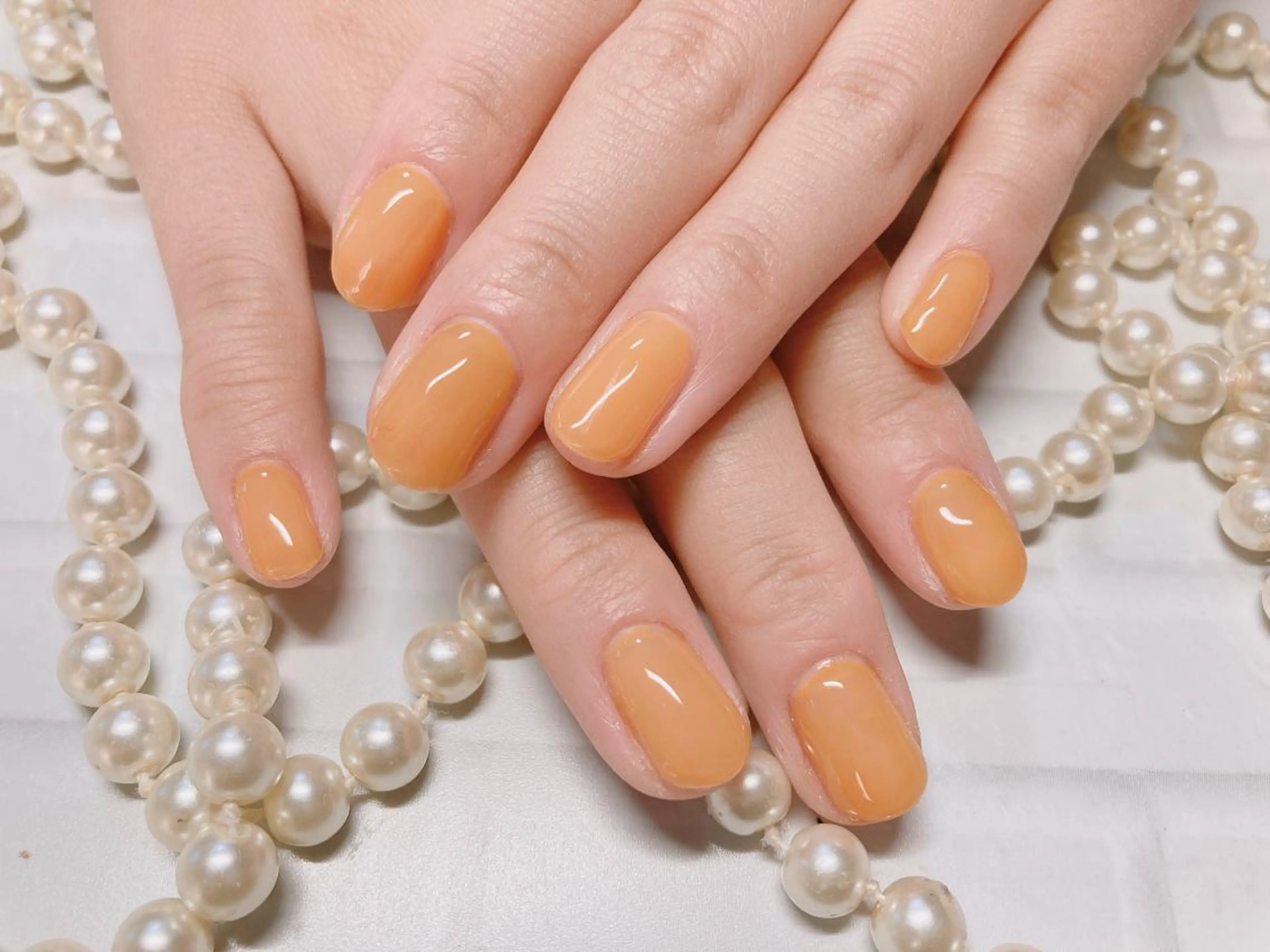 ネイル オレンジ ハンドネイル フットネイル ネイルサロン HARRYS所属・ネイル･脱毛サロン HARRYSのエステ・リラクイメージ