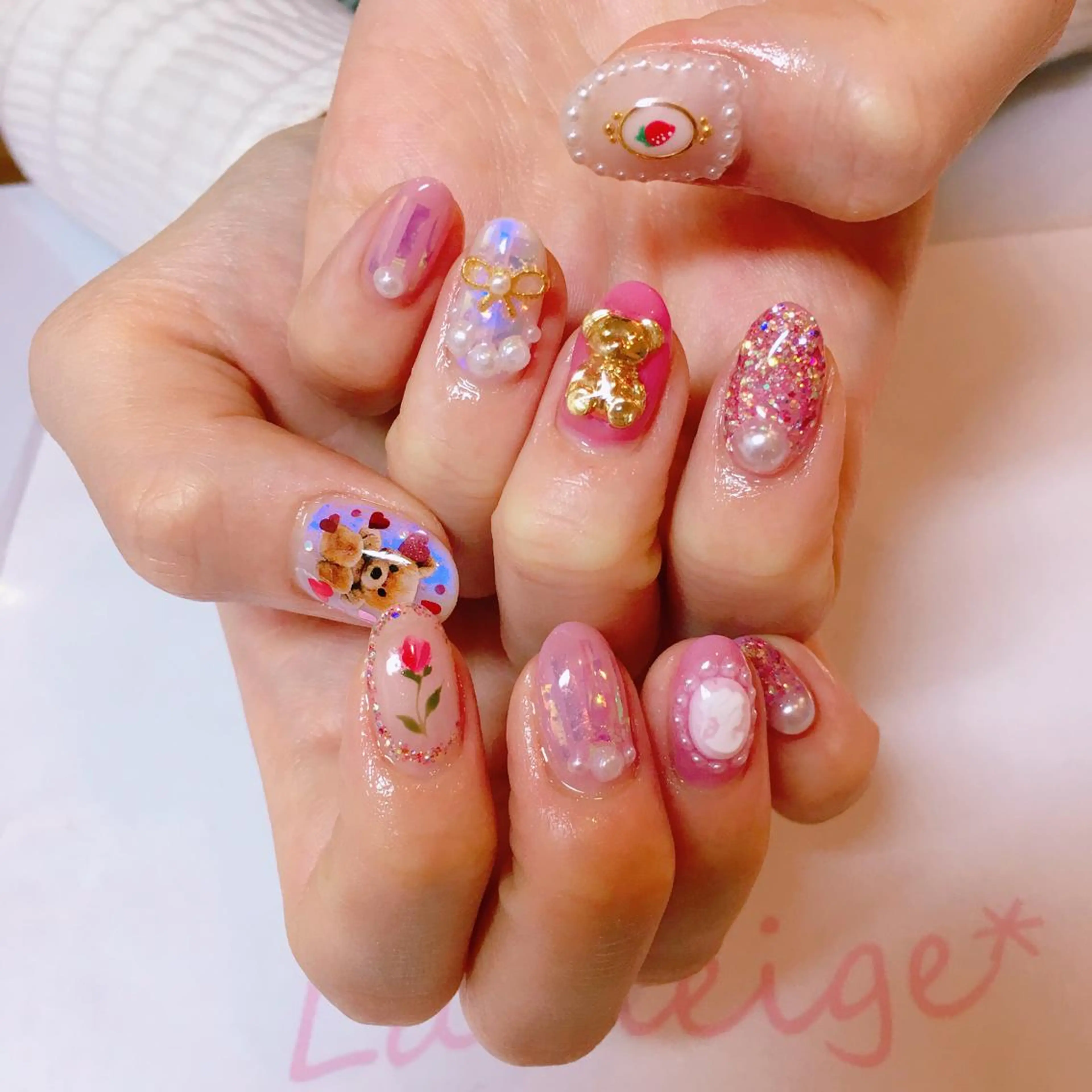 ネイル リボン La neige* yuki 🥯🍑のネイルデザイン