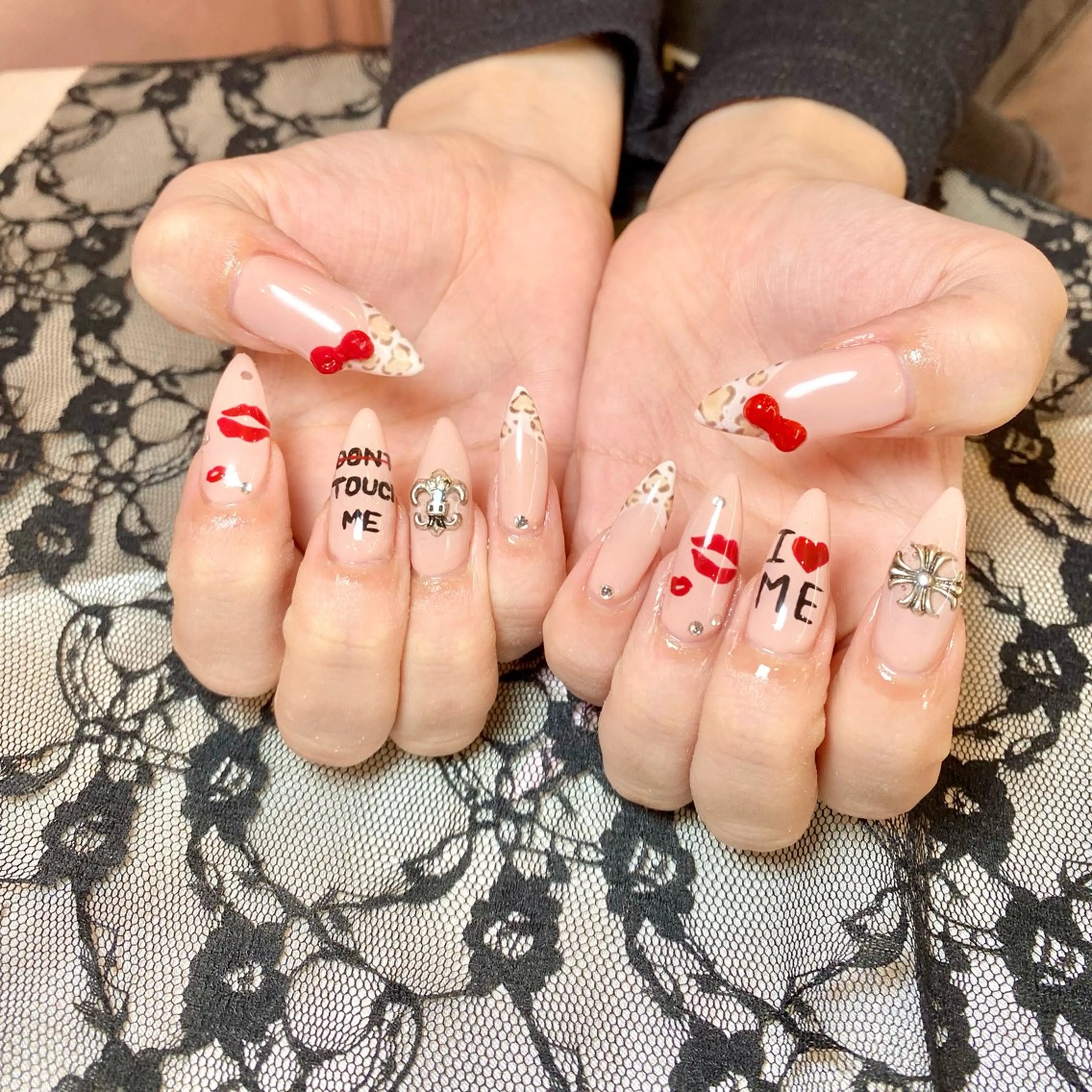 ネイル アニマル柄 ロングネイル ハンドネイル mio nail TANIのネイルデザイン