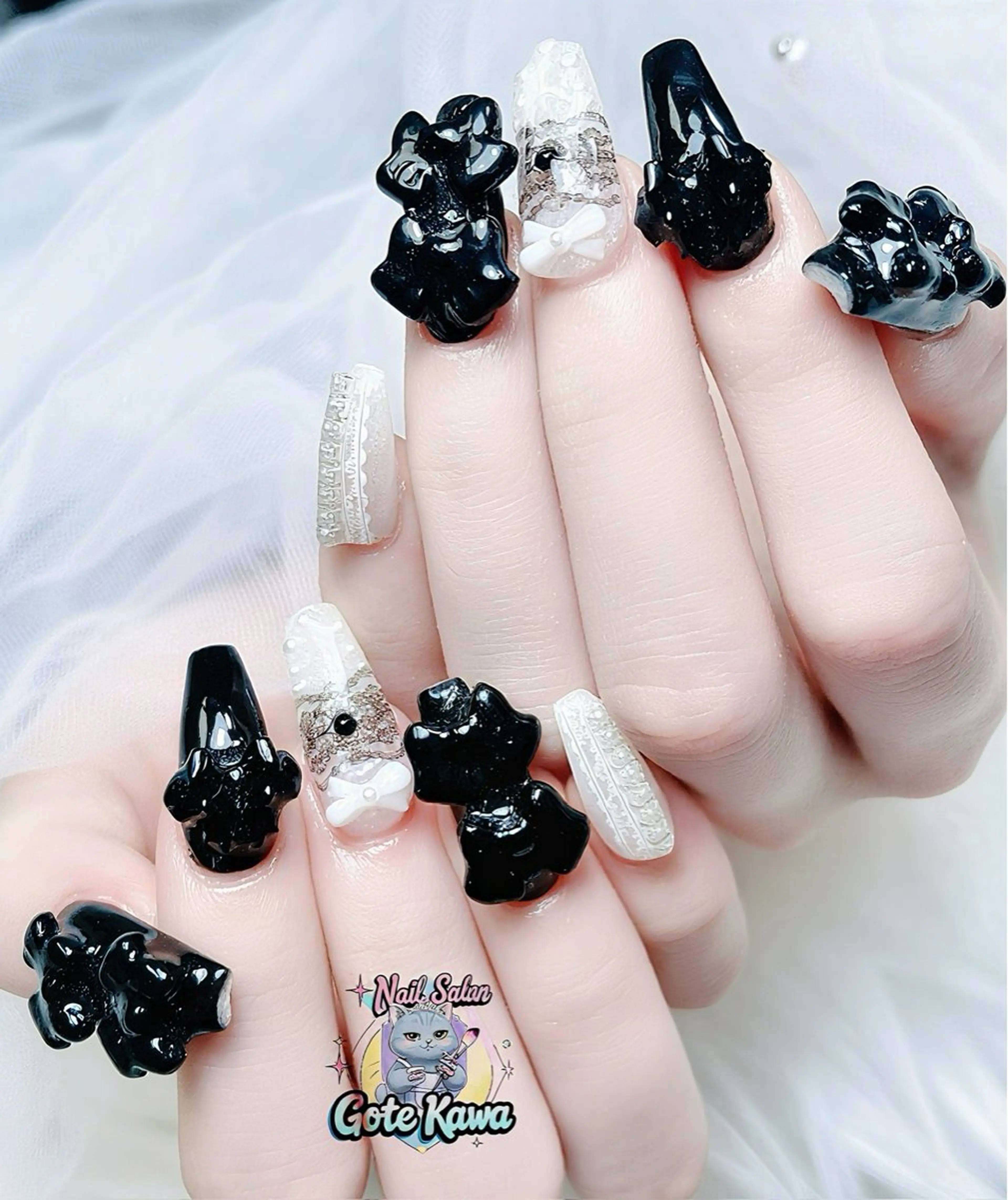 ネイル アートネイル 長さ出し キラキラネイル ピンク リボン ハンドネイル ハンドケア GOTE KAWA Nail Salon(ゴテかわ)所属・Gote Kawa nail salonのネイルデザイン