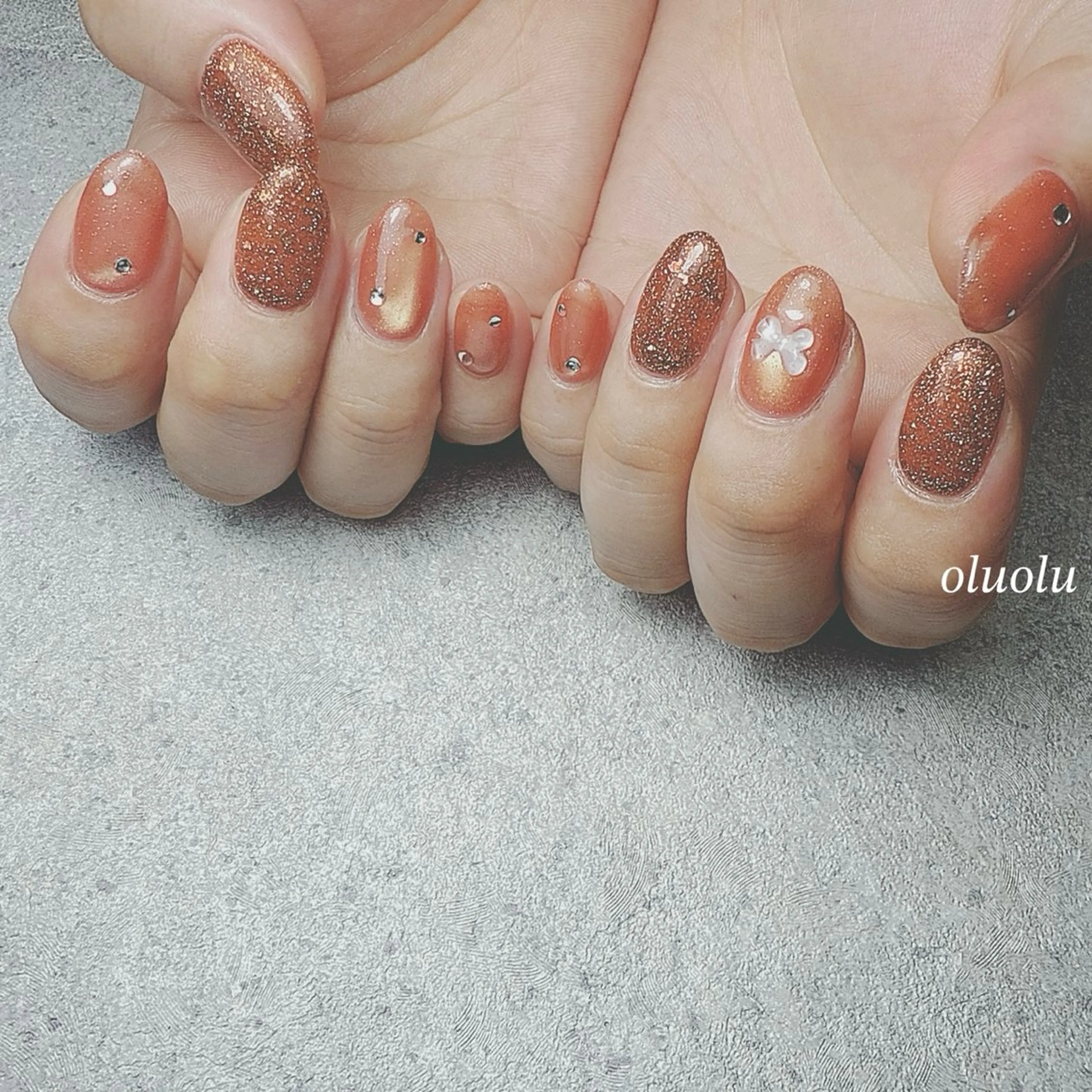 ネイル アートネイル フラッシュネイル マグネットネイル オレンジ リボン ハンドネイル 大村 紬華のネイルデザイン