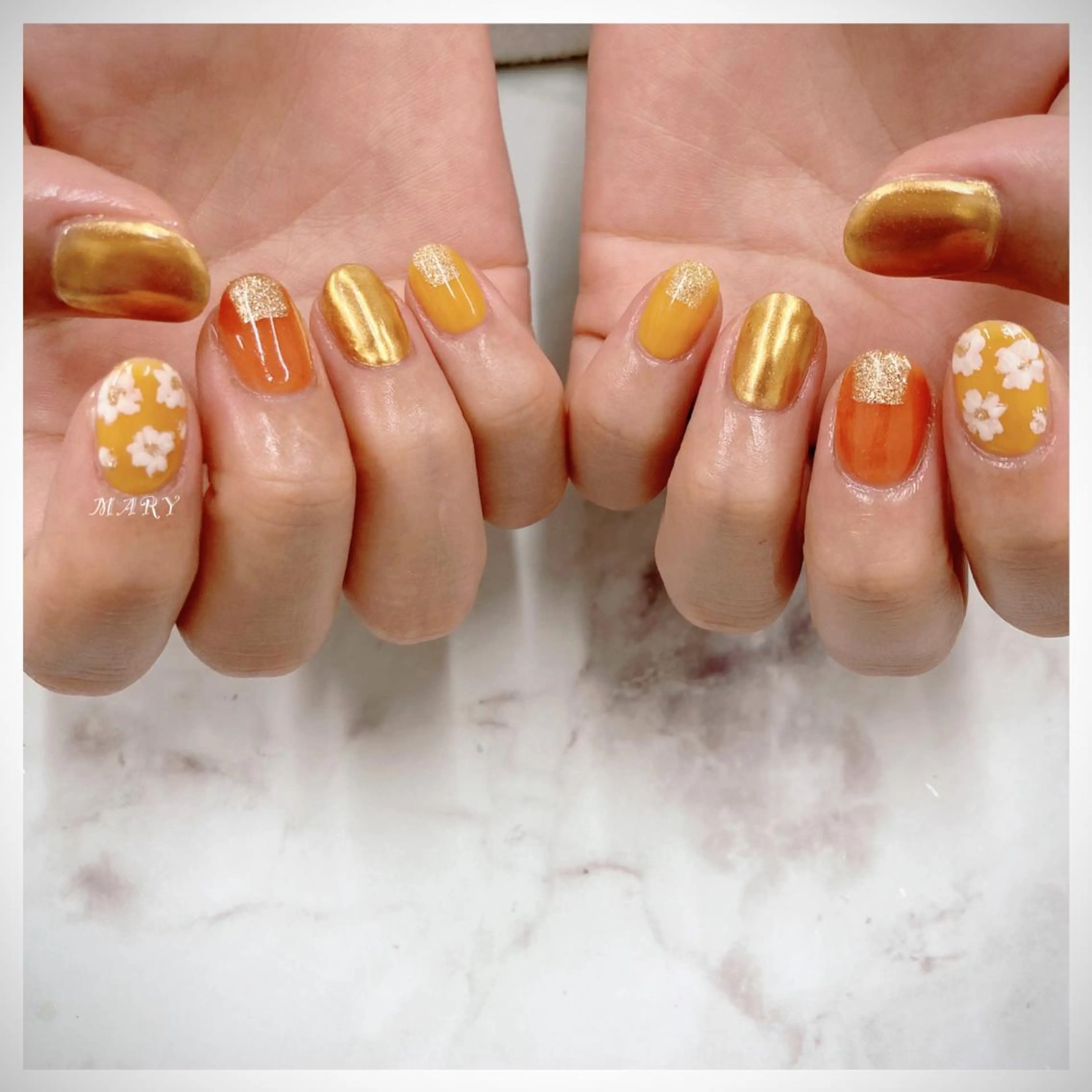 ネイル フラワーネイル ミラーネイル ニュアンスネイル ワンカラーネイル オレンジ ハンドネイル Mary nail所属・Mary nail .narumiのネイルデザイン