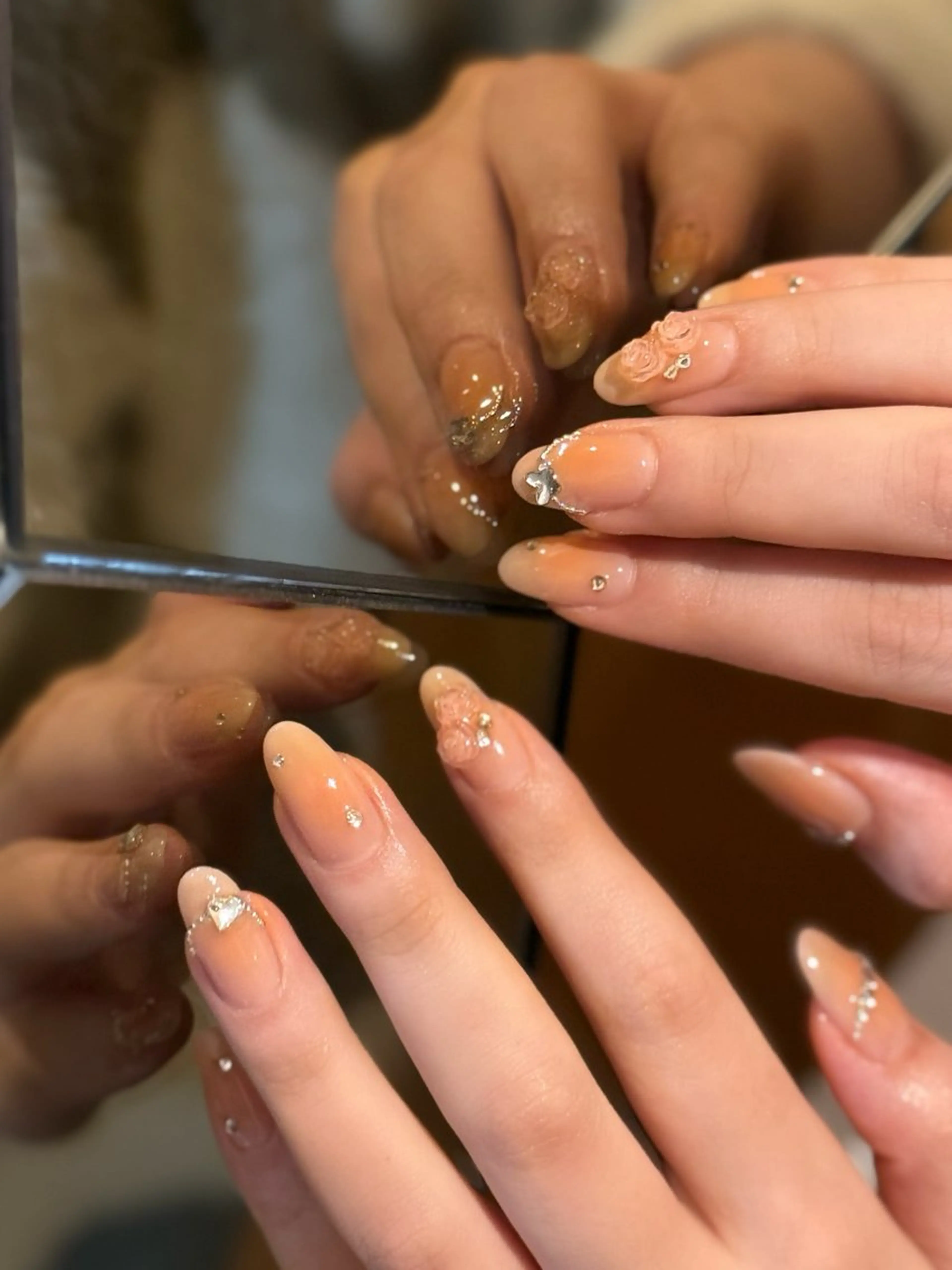 ネイル チークネイル 成人式 オレンジ ハンドネイル each kiyokaのネイルデザイン