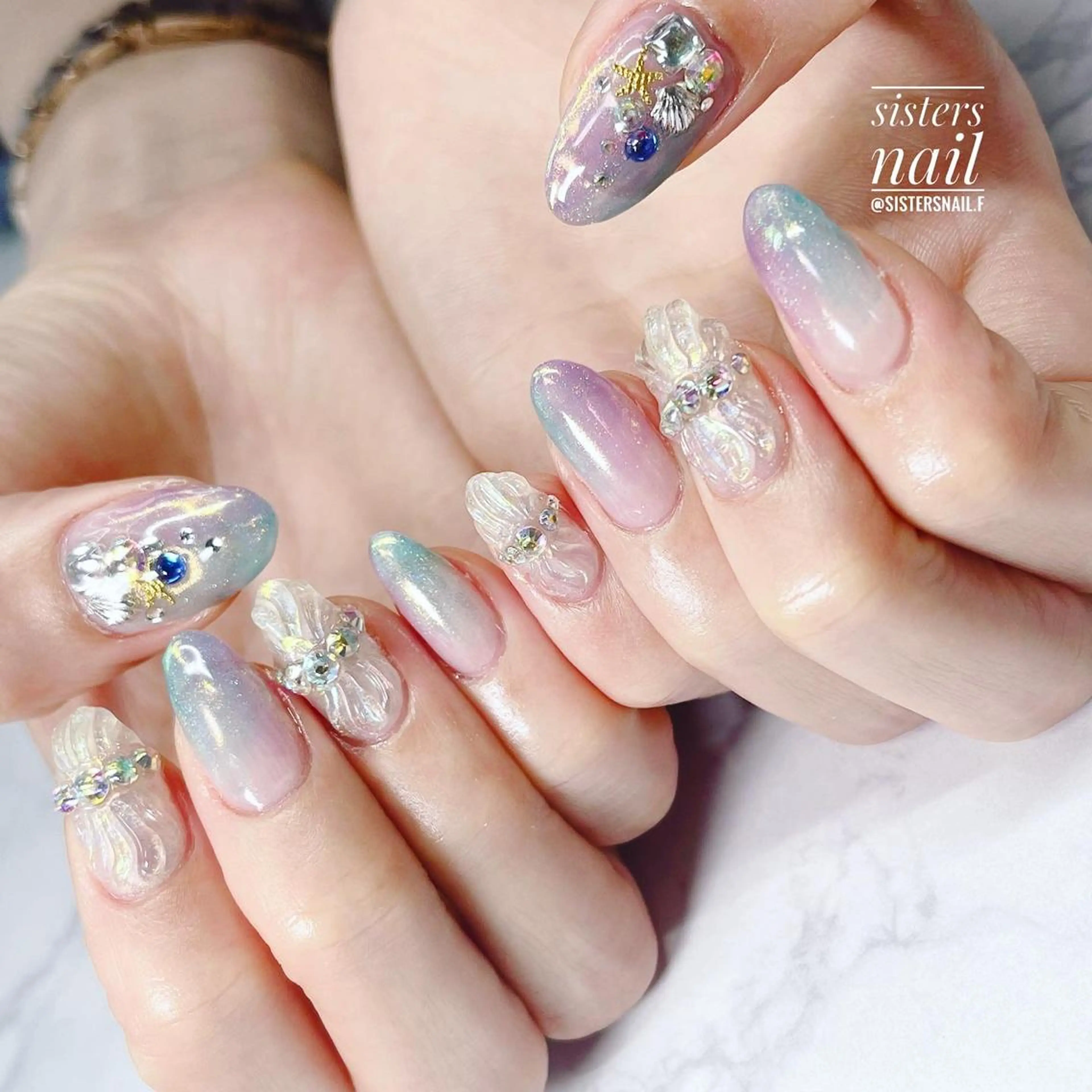 ネイル アートネイル オーロラネイル ブルー グラデーション パステルネイル sisters nail.fのネイルデザイン